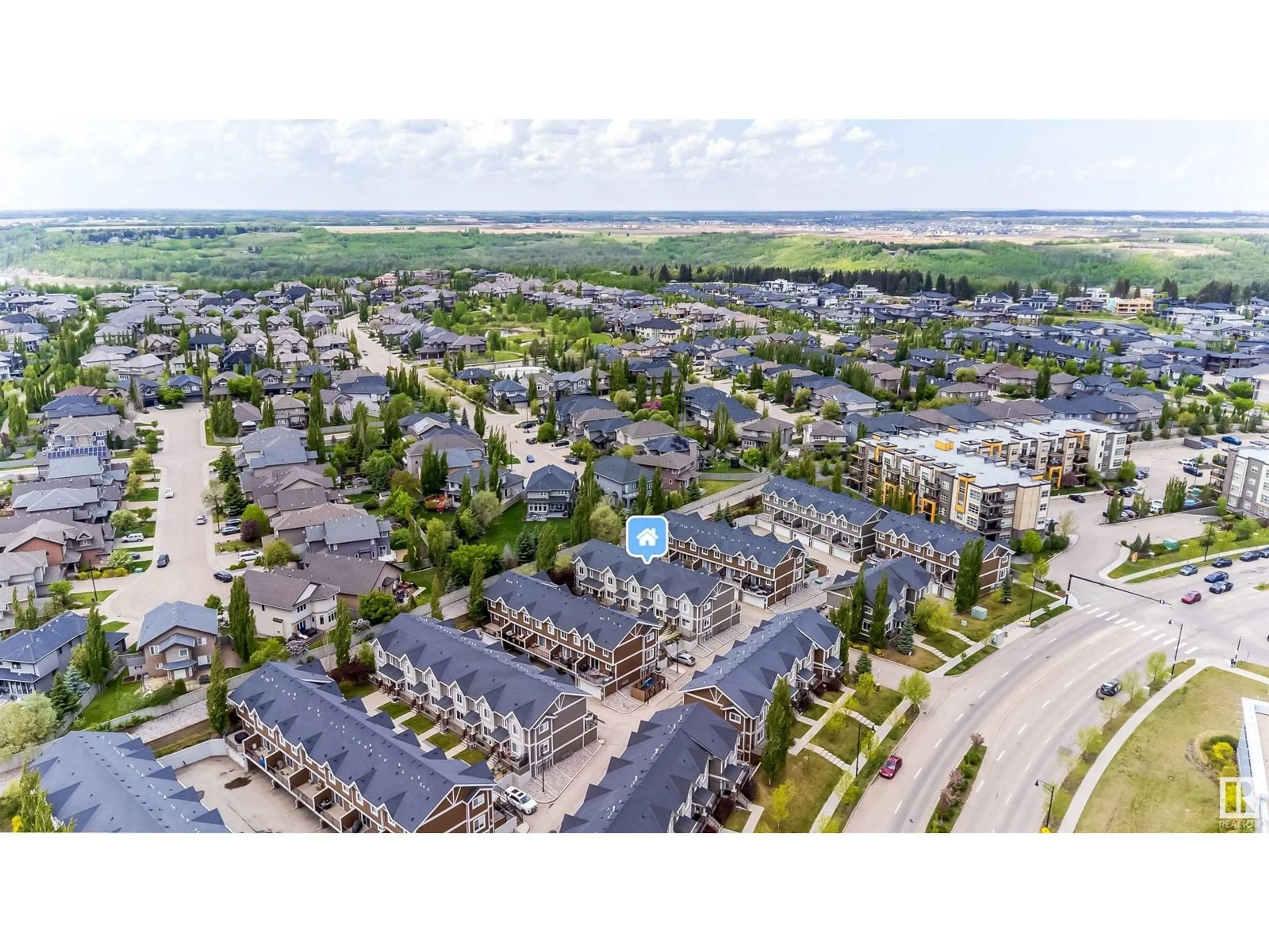 A pic from outside/outdoor area/front of a property/back of a property/a pic from drone, street for #20 - 1150 WINDERMERE WY, Edmonton Alberta T6W2B6
