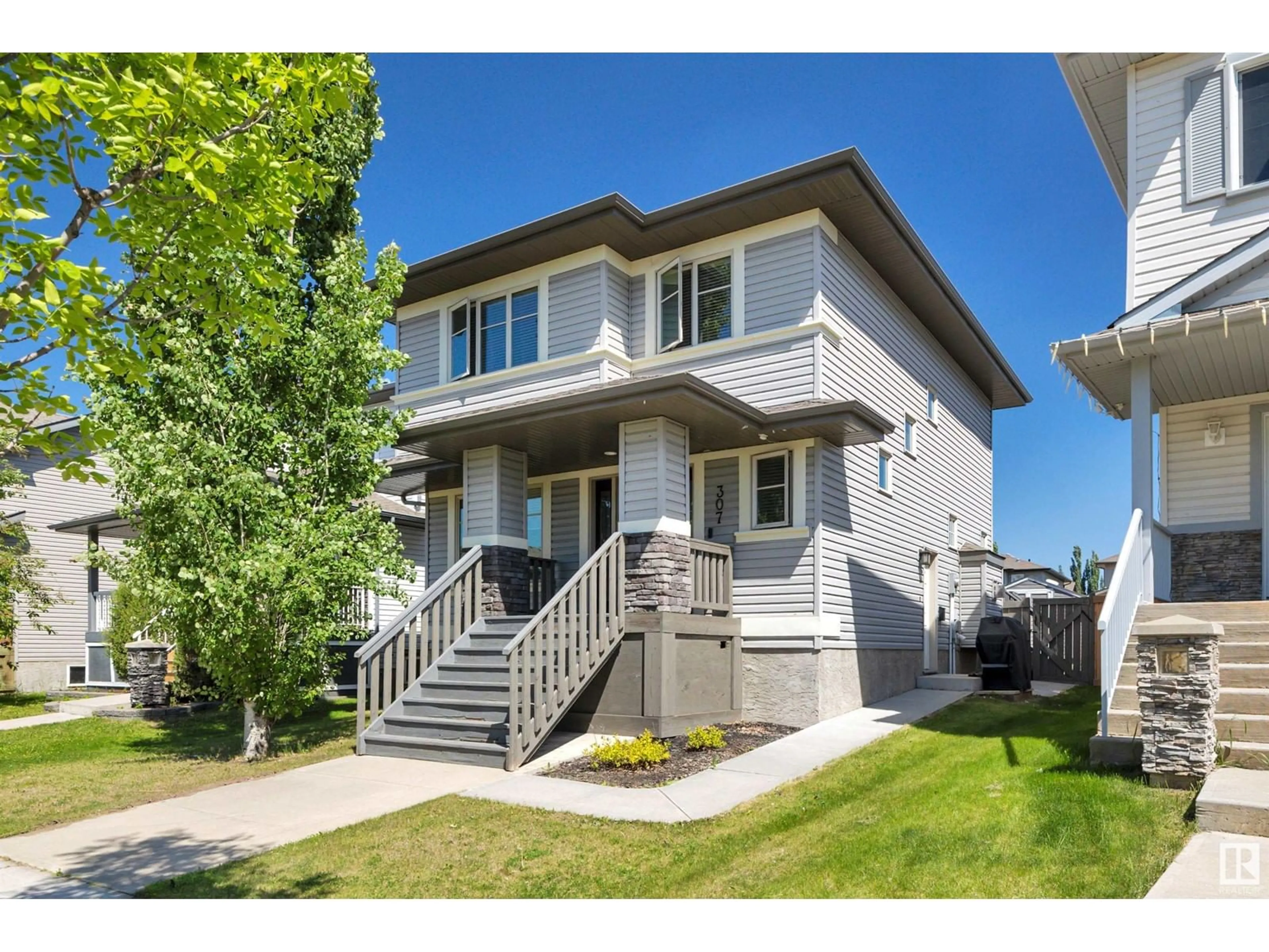 Home with vinyl exterior material, street for 307 AVENA LI, Leduc Alberta T9E0L8