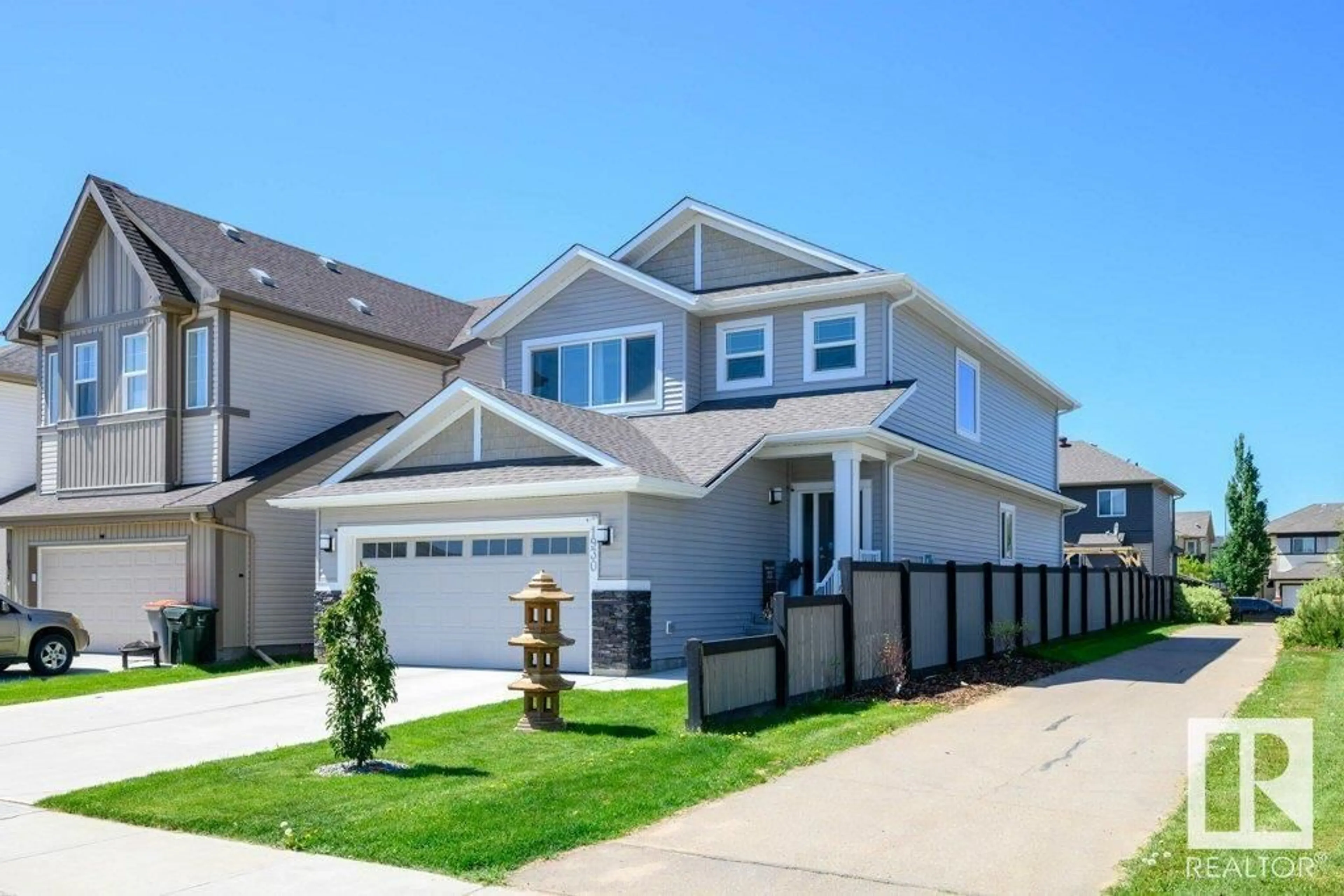 Home with vinyl exterior material, street for 1930 WESTERRA LN, Stony Plain Alberta T7Z0L3