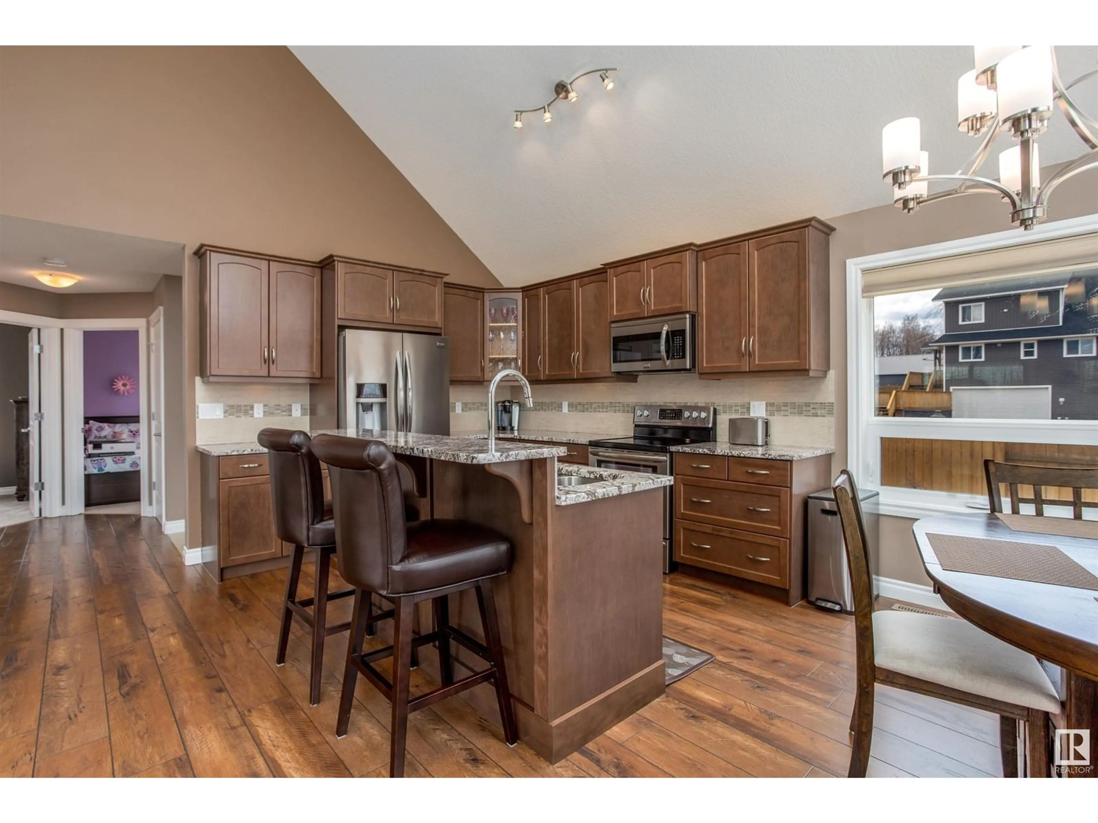 Open concept kitchen, wood/laminate floor for 162 - 219 PEACE RIVER AV, Joussard Alberta T0G1J0