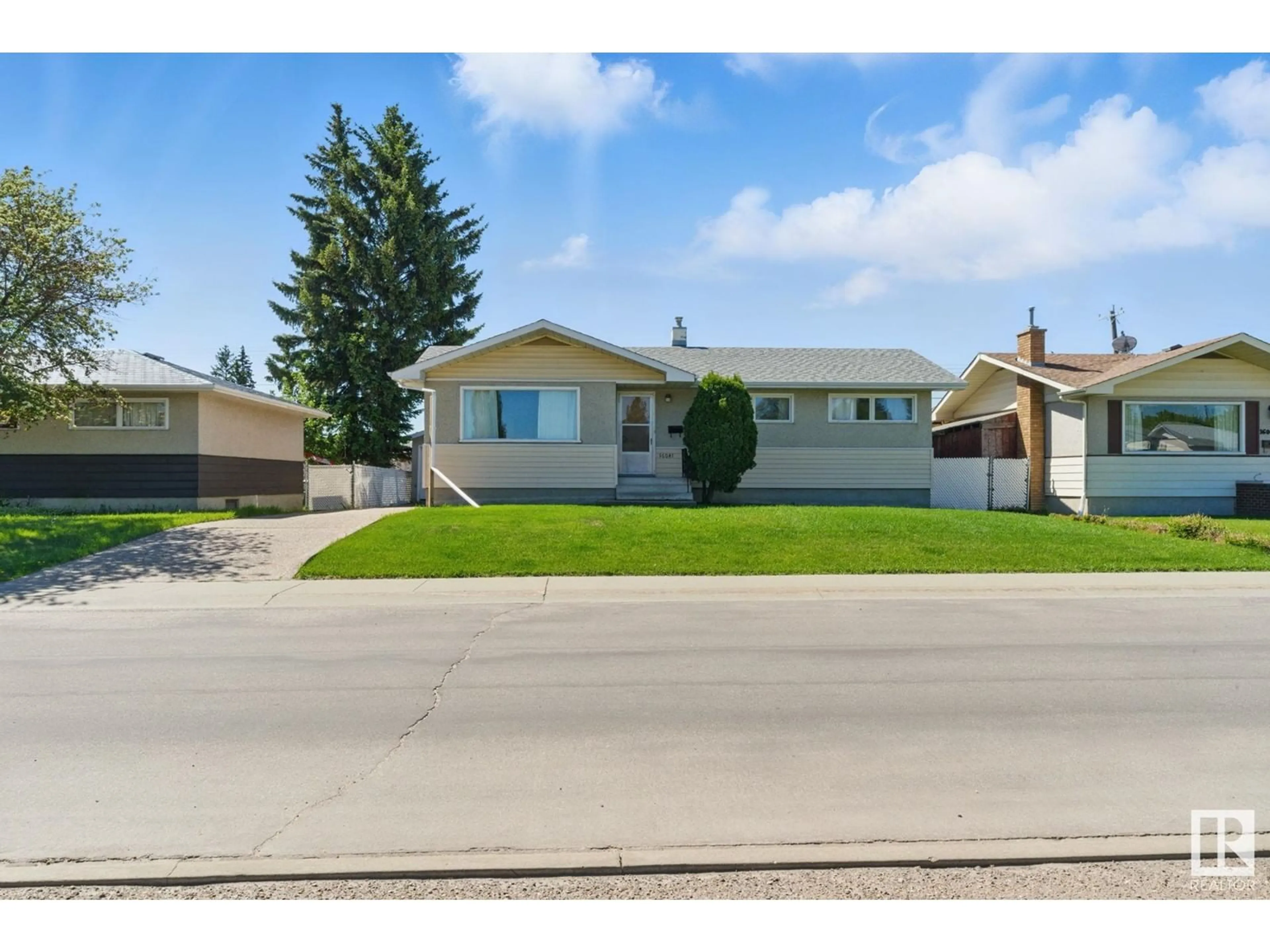 Home with vinyl exterior material, street for 16041 95 AV, Edmonton Alberta T5P0A8