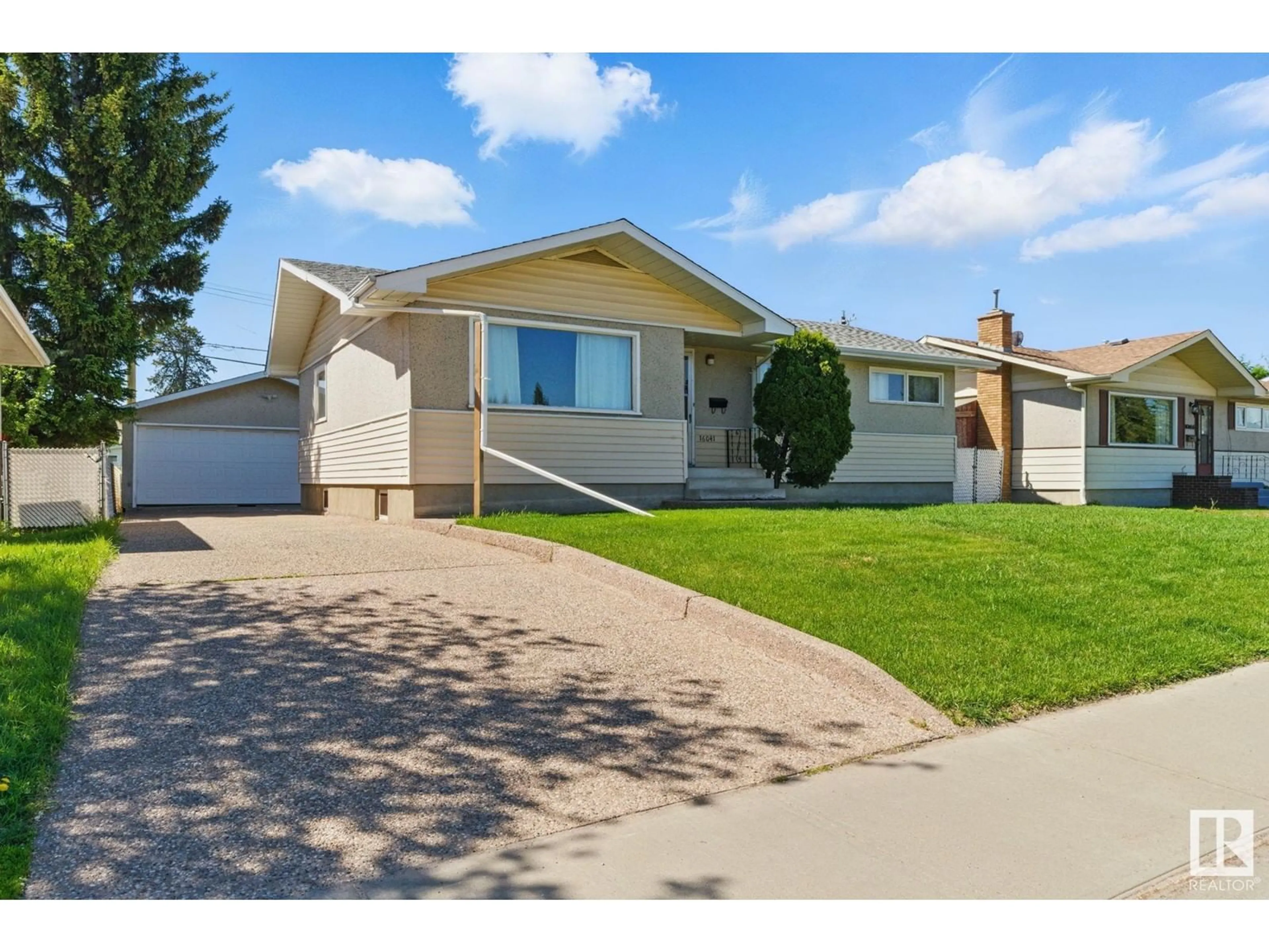 Home with vinyl exterior material, street for 16041 95 AV, Edmonton Alberta T5P0A8