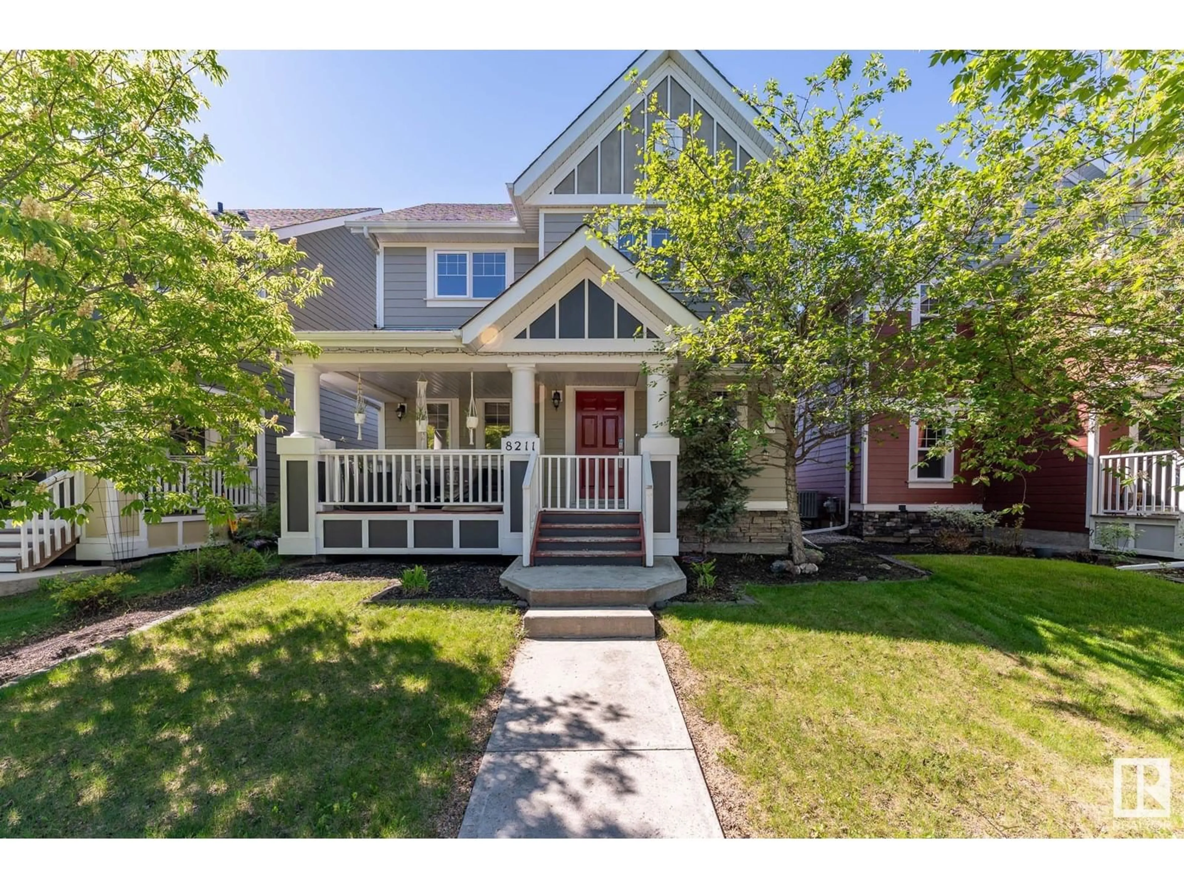 Home with vinyl exterior material, street for 8211 SUMMERSIDE GRANDE BV, Edmonton Alberta T6X0J2