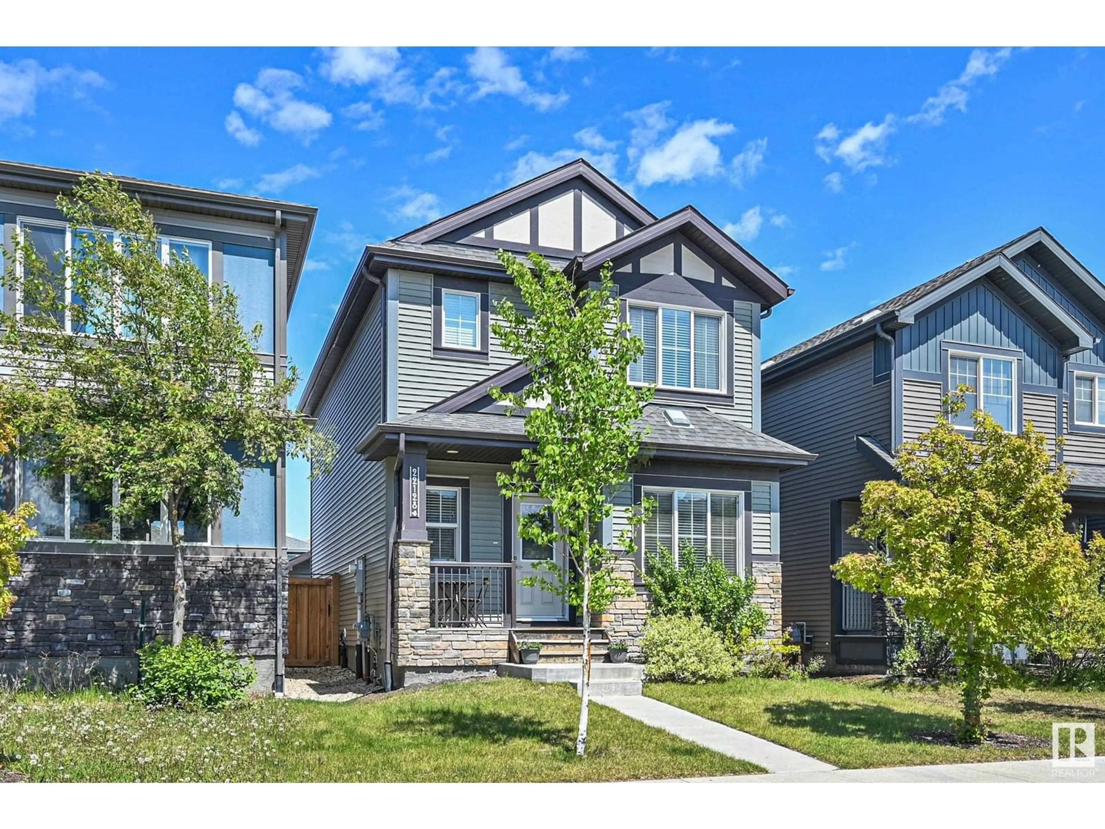 Home with brick exterior material, street for 22128 87 AV, Edmonton Alberta T5T1K8