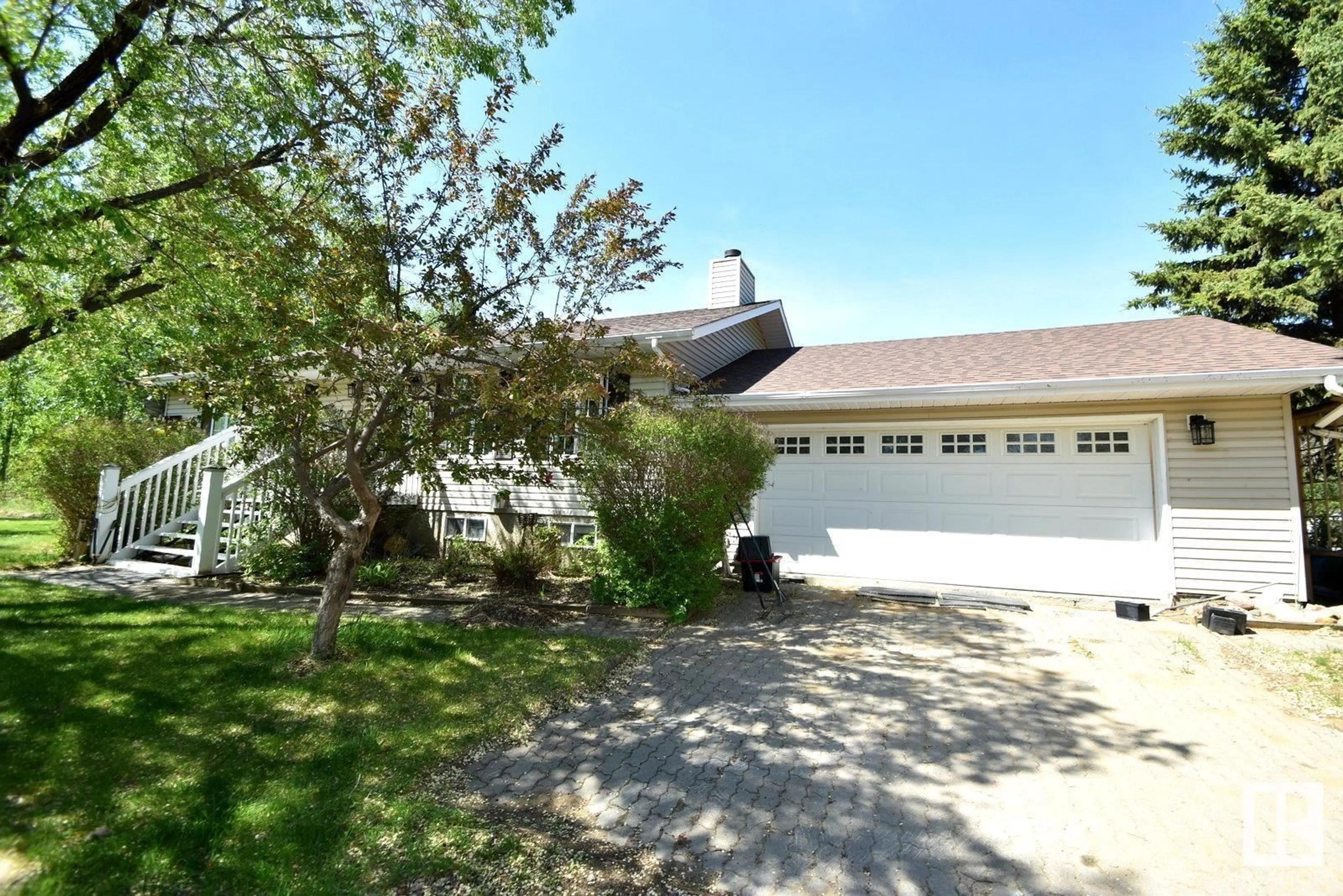 A pic from outside/outdoor area/front of a property/back of a property/a pic from drone, street for 19 - 57104 HWY 38, Rural Sturgeon County Alberta T0A2W0