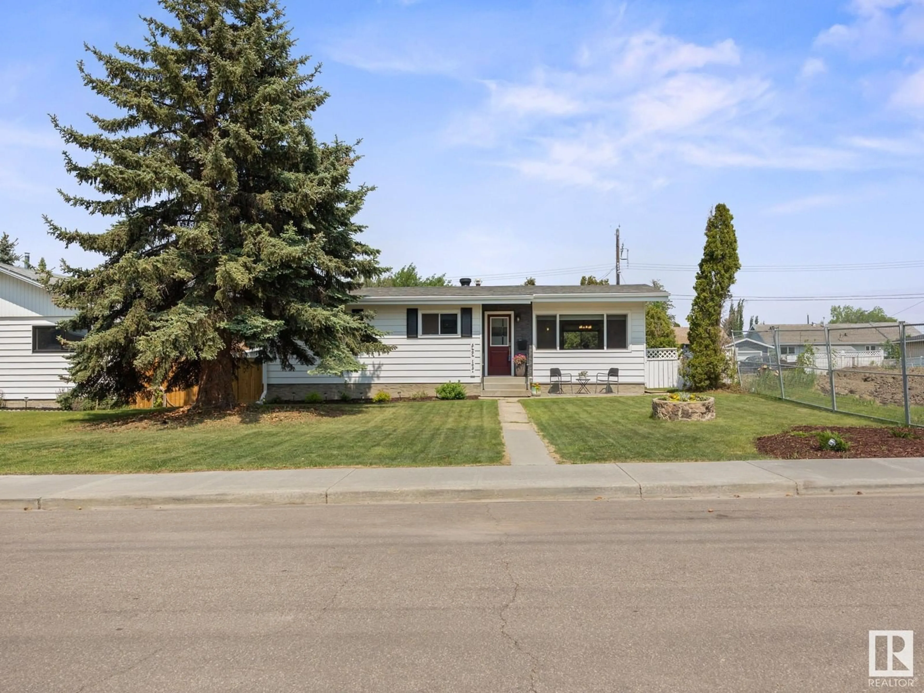 Home with vinyl exterior material, street for 5404 103A AV, Edmonton Alberta T6A0W6