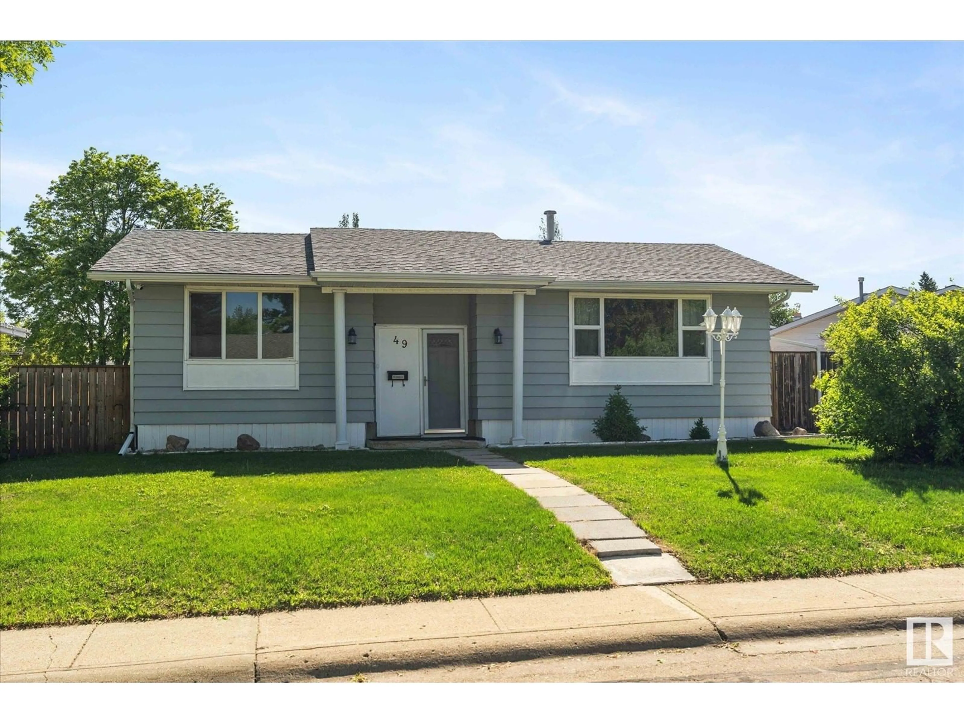 Home with vinyl exterior material, street for 49 BRAZEAU DR, Devon Alberta T9G1M3