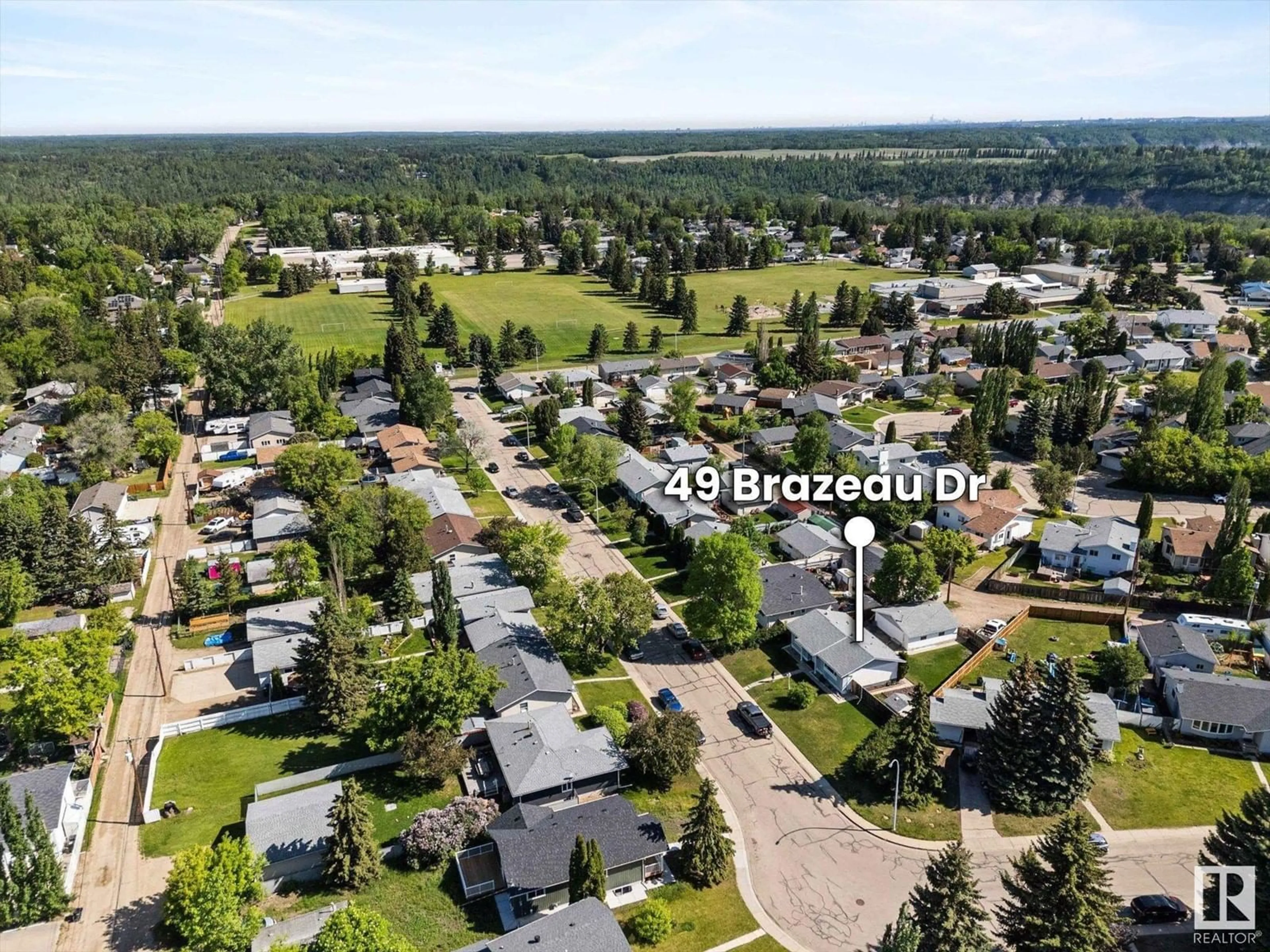 A pic from outside/outdoor area/front of a property/back of a property/a pic from drone, street for 49 BRAZEAU DR, Devon Alberta T9G1M3