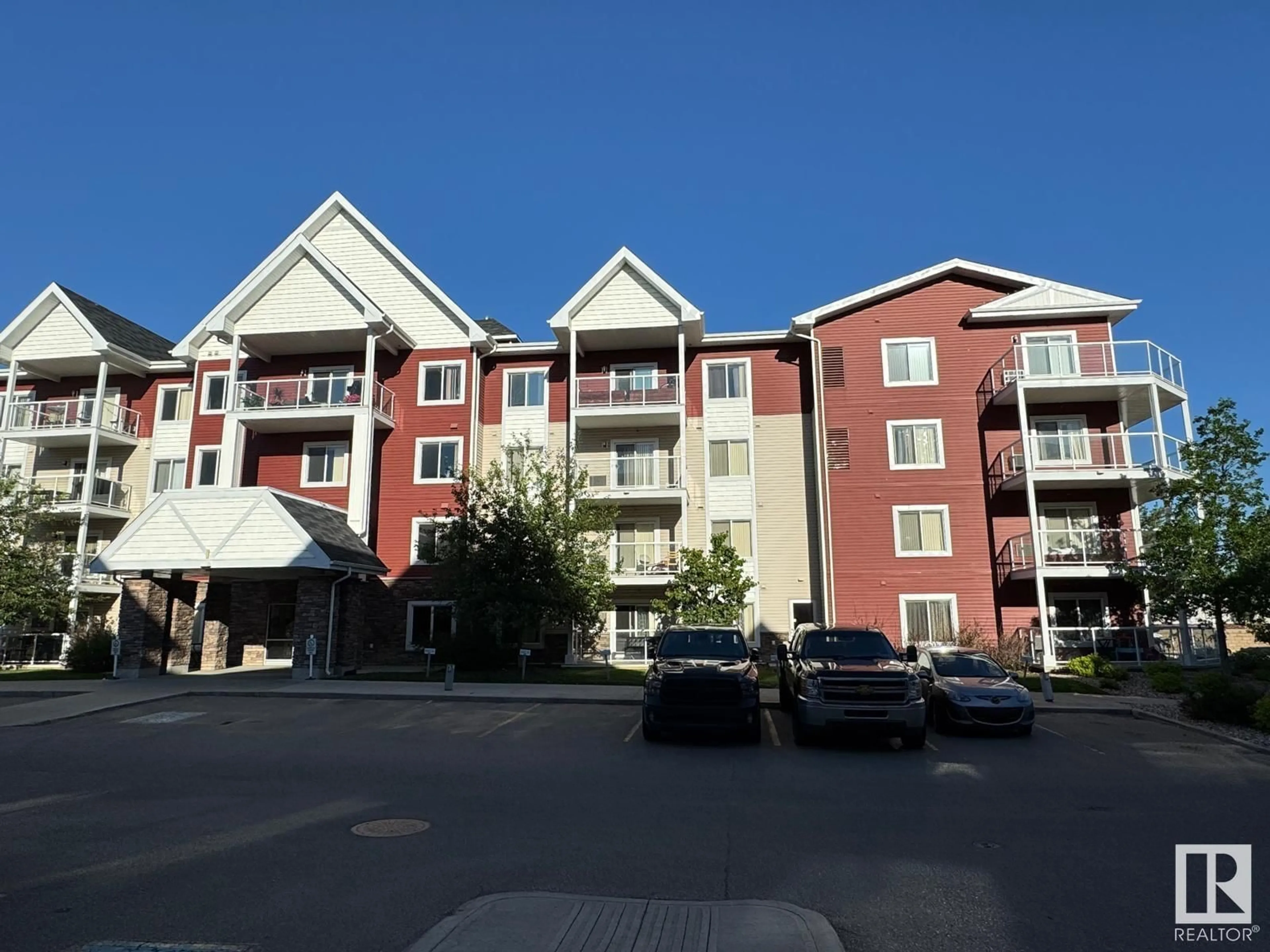 A pic from outside/outdoor area/front of a property/back of a property/a pic from drone, unknown for 102 - 2203 44 AVE NW, Edmonton Alberta T6T0T1