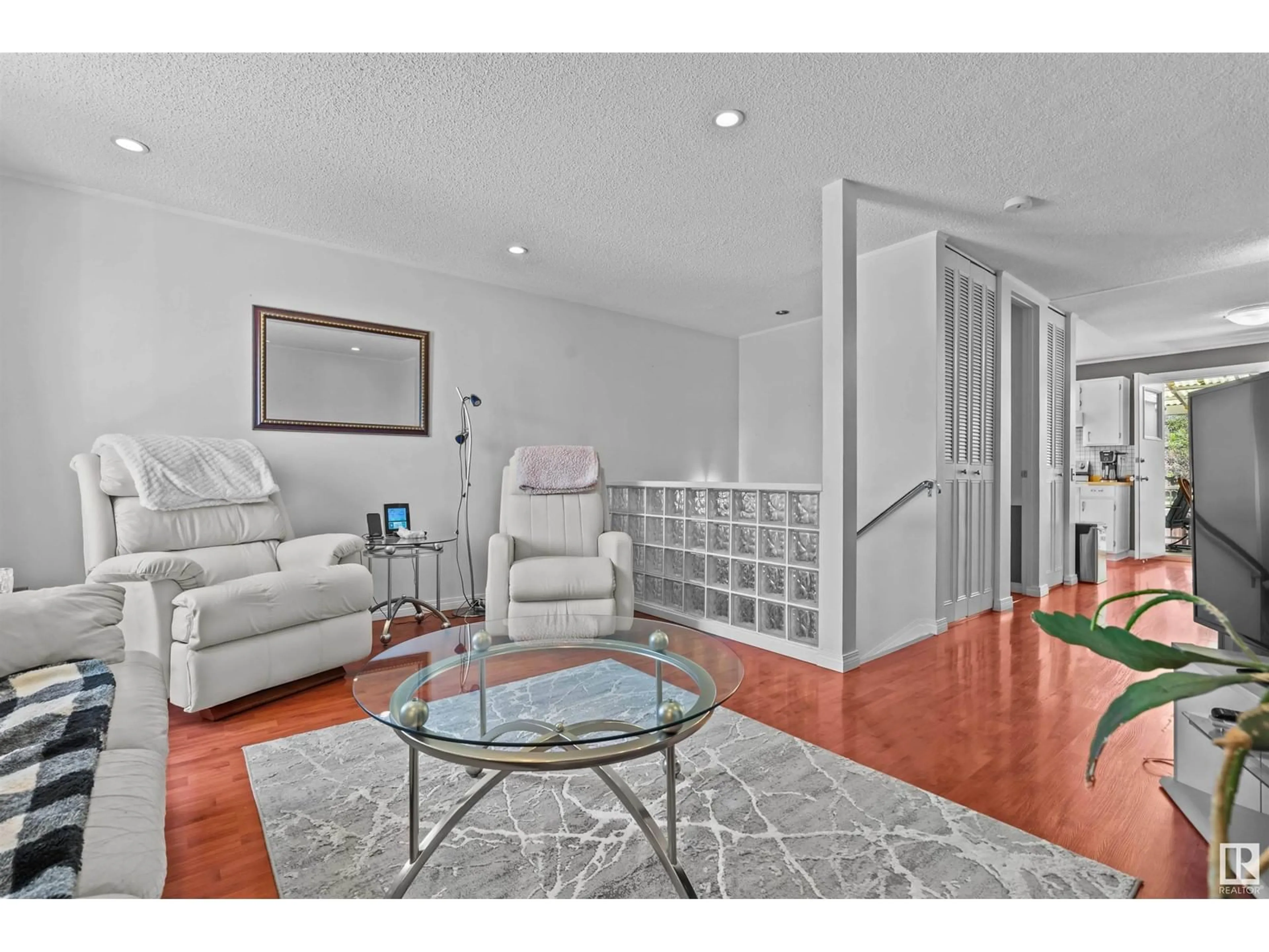 Living room with furniture, unknown for 10416 98 AV, Morinville Alberta T8R1C8