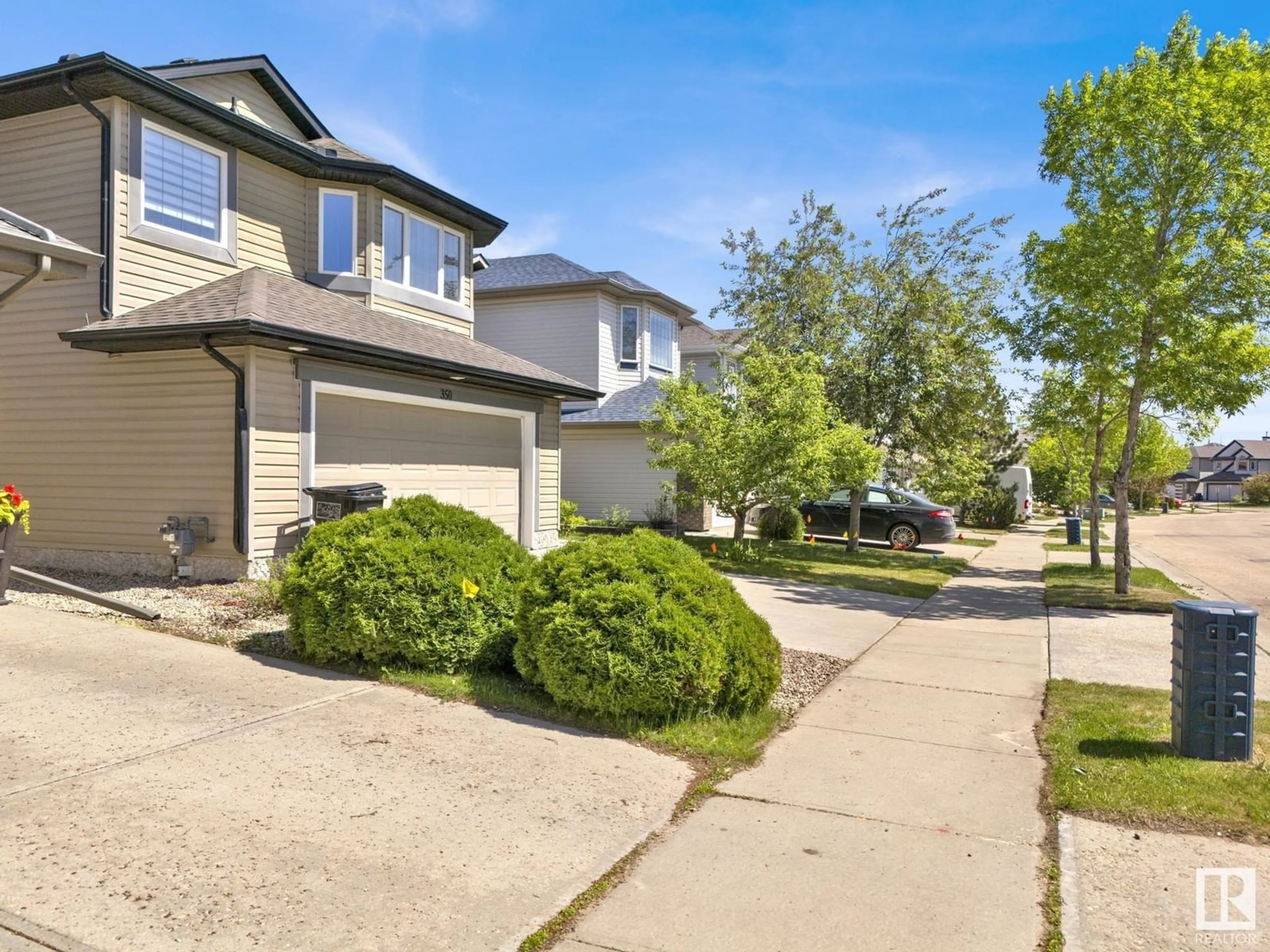 A pic from outside/outdoor area/front of a property/back of a property/a pic from drone, street for 350 MACEWAN RD, Edmonton Alberta T6W1V5