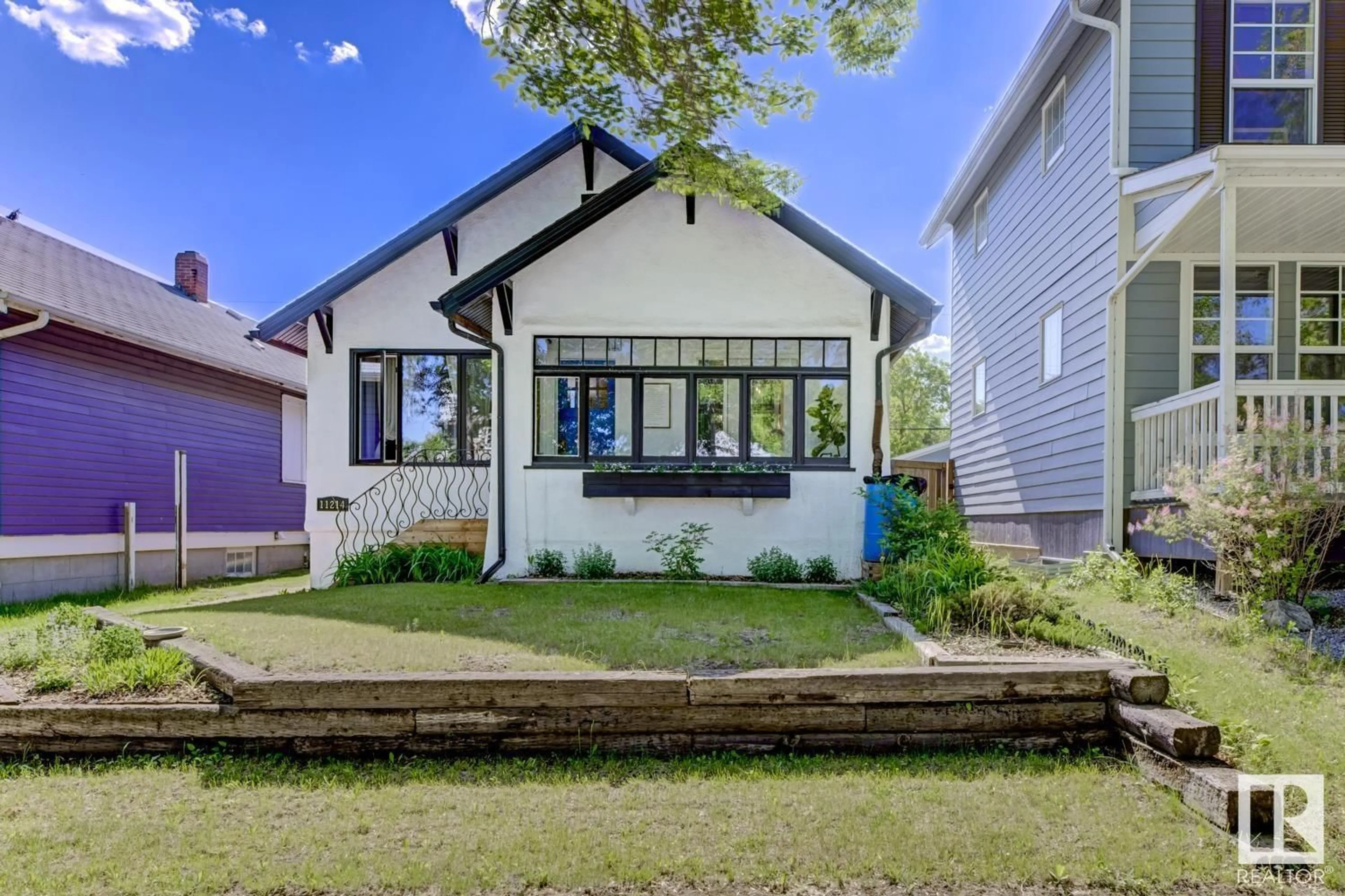 Home with brick exterior material, street for NW - 11214 67 ST, Edmonton Alberta T5B1L1