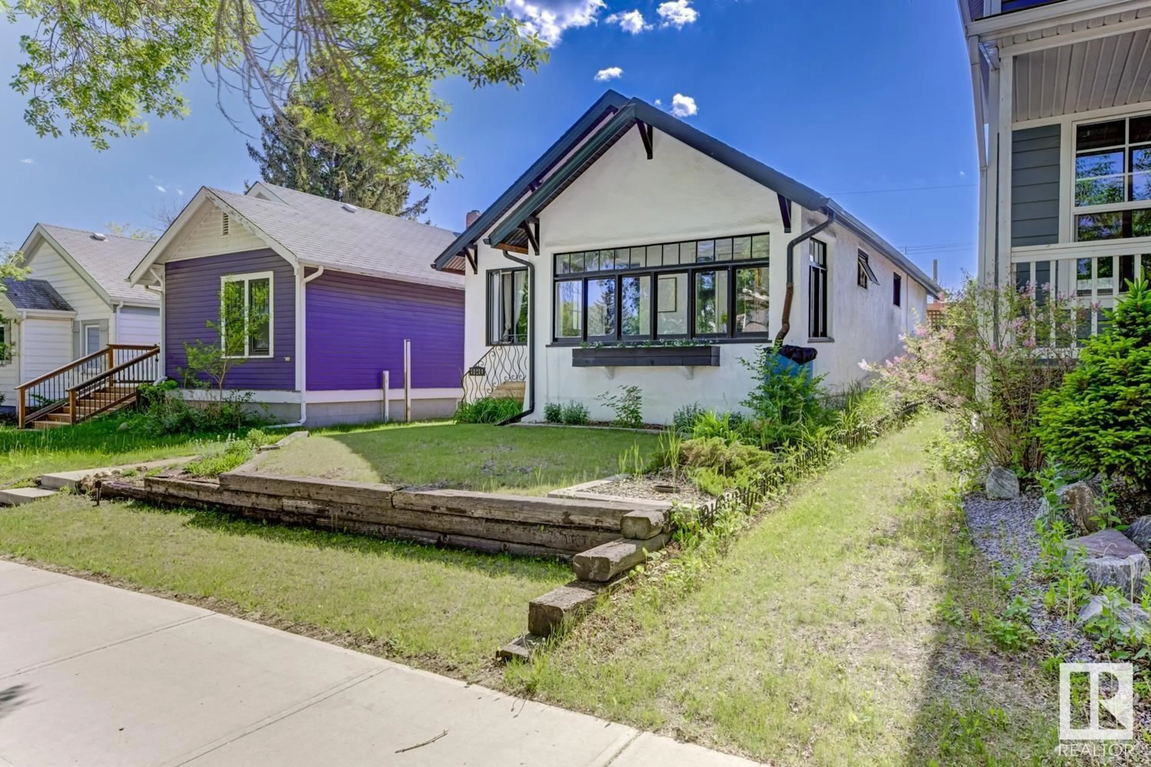 Home with brick exterior material, street for NW - 11214 67 ST, Edmonton Alberta T5B1L1