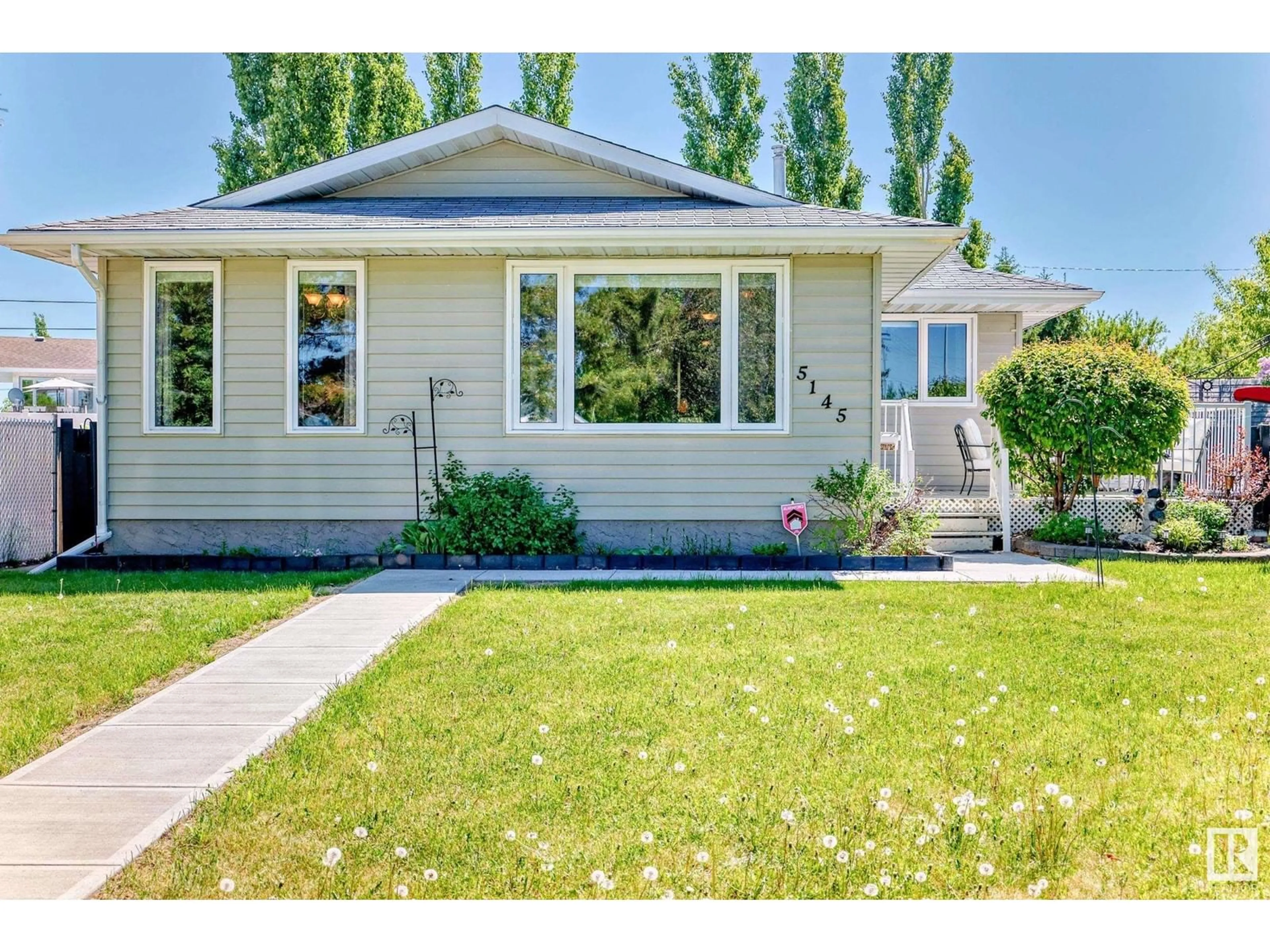 Home with vinyl exterior material, street for 5145 49 AV, Millet Alberta T0C1Z0