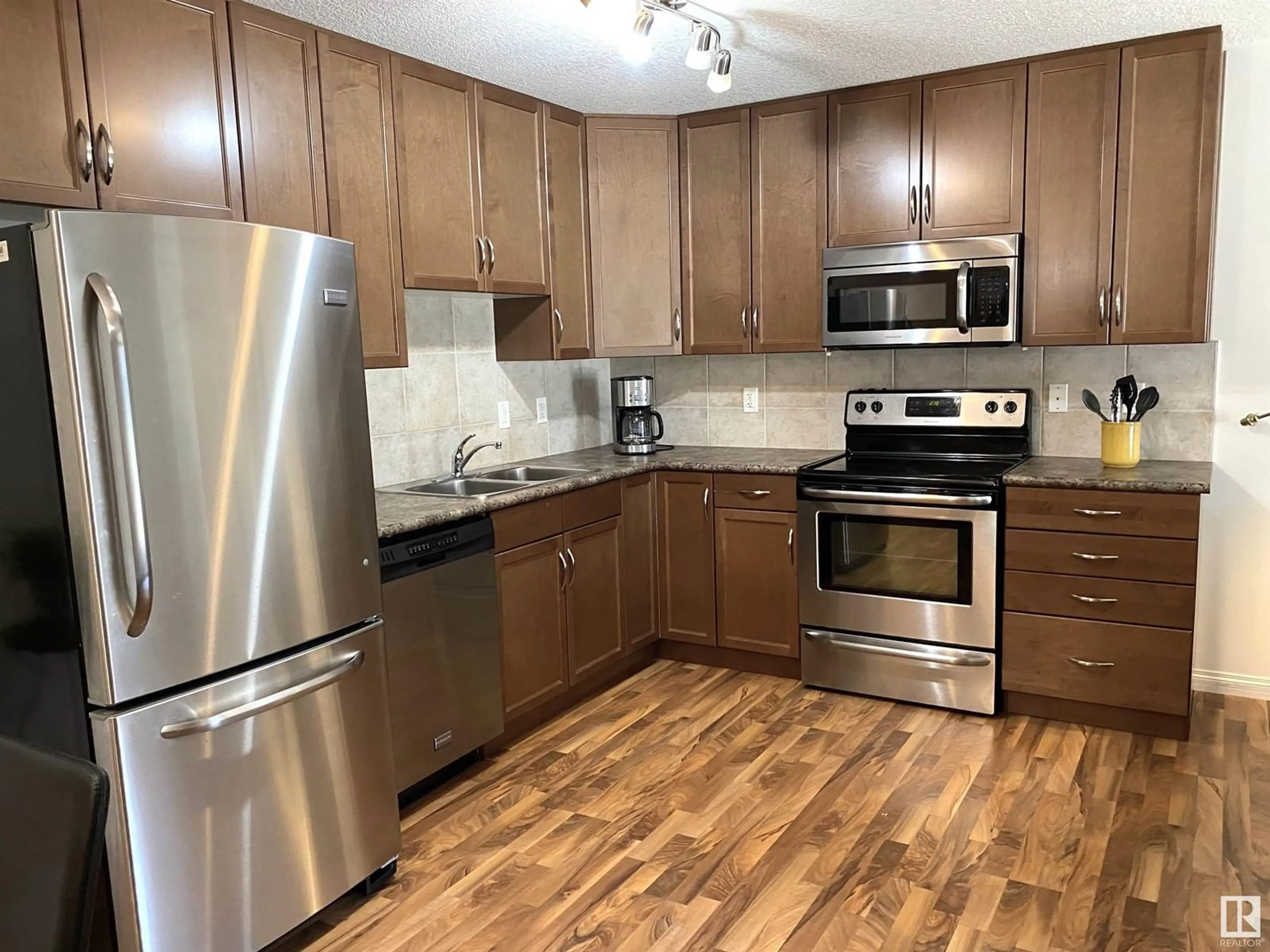 Standard kitchen, wood/laminate floor for #216 - 1204 156 ST, Edmonton Alberta T6R0R6