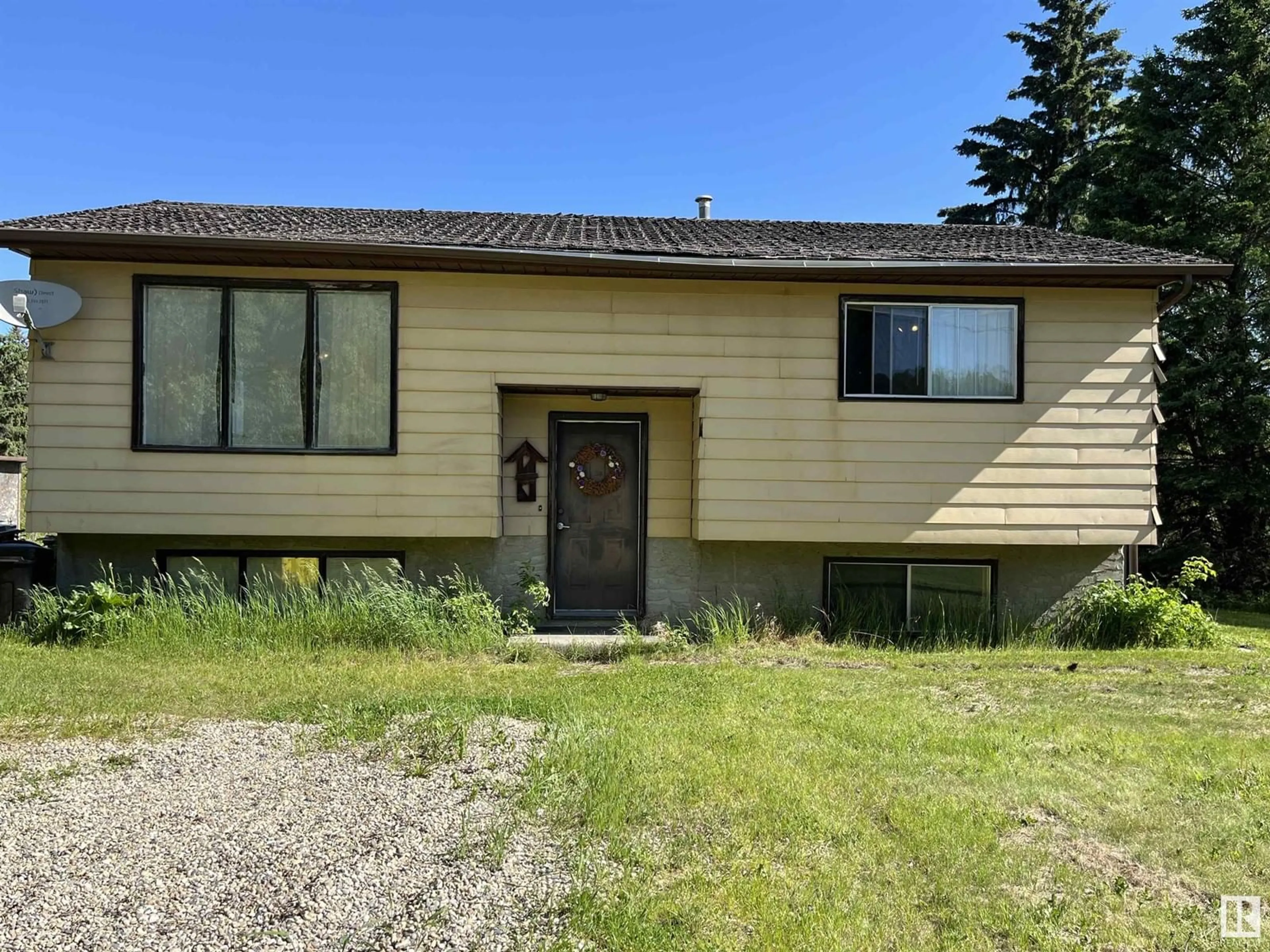 Home with vinyl exterior material, street for #22 - 55022 RGE ROAD 11A, Rural Lac Ste. Anne County Alberta T0E1V0