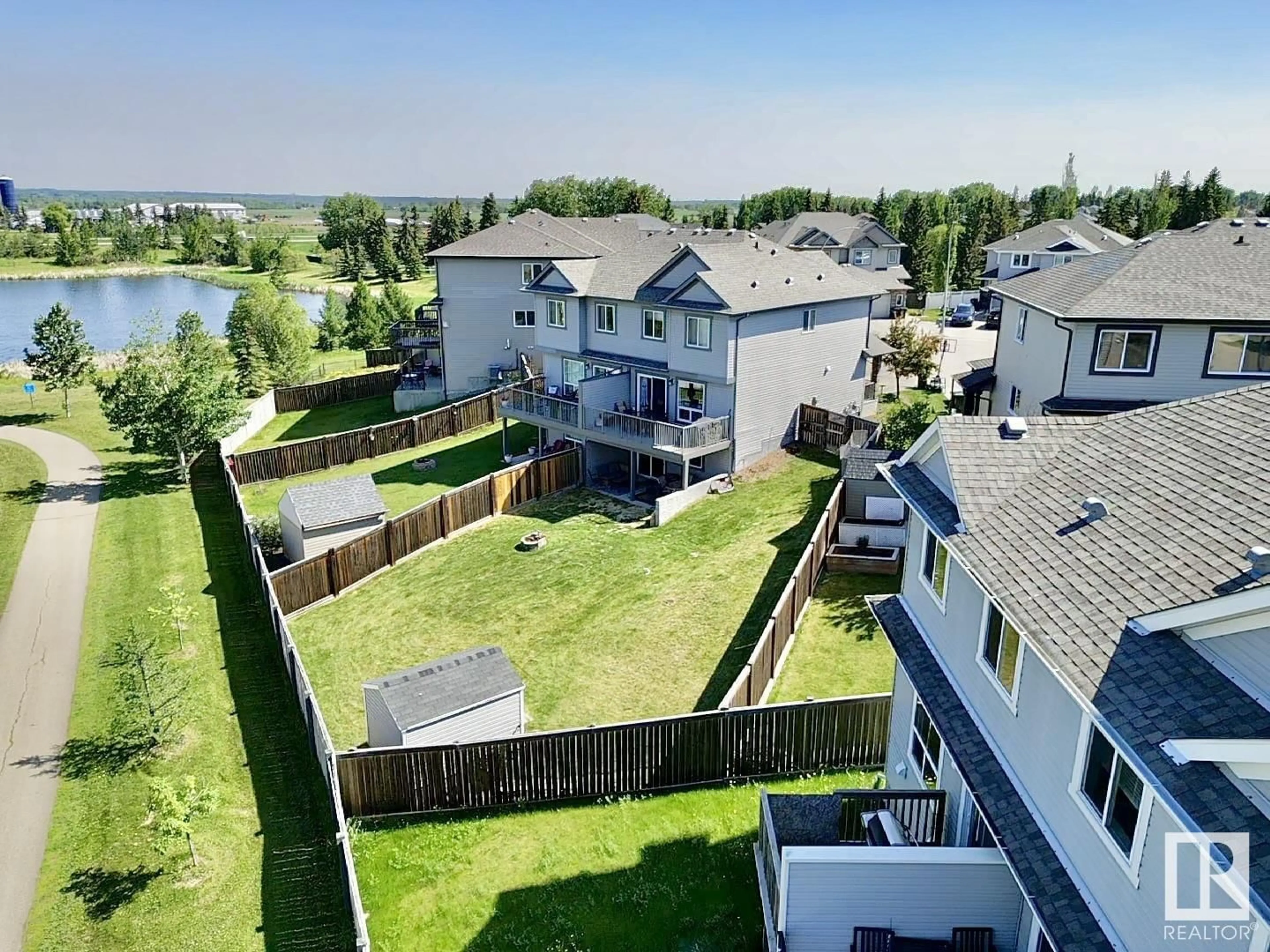 A pic from outside/outdoor area/front of a property/back of a property/a pic from drone, water/lake/river/ocean view for 64 AUSTIN CO, Spruce Grove Alberta T7X0N4
