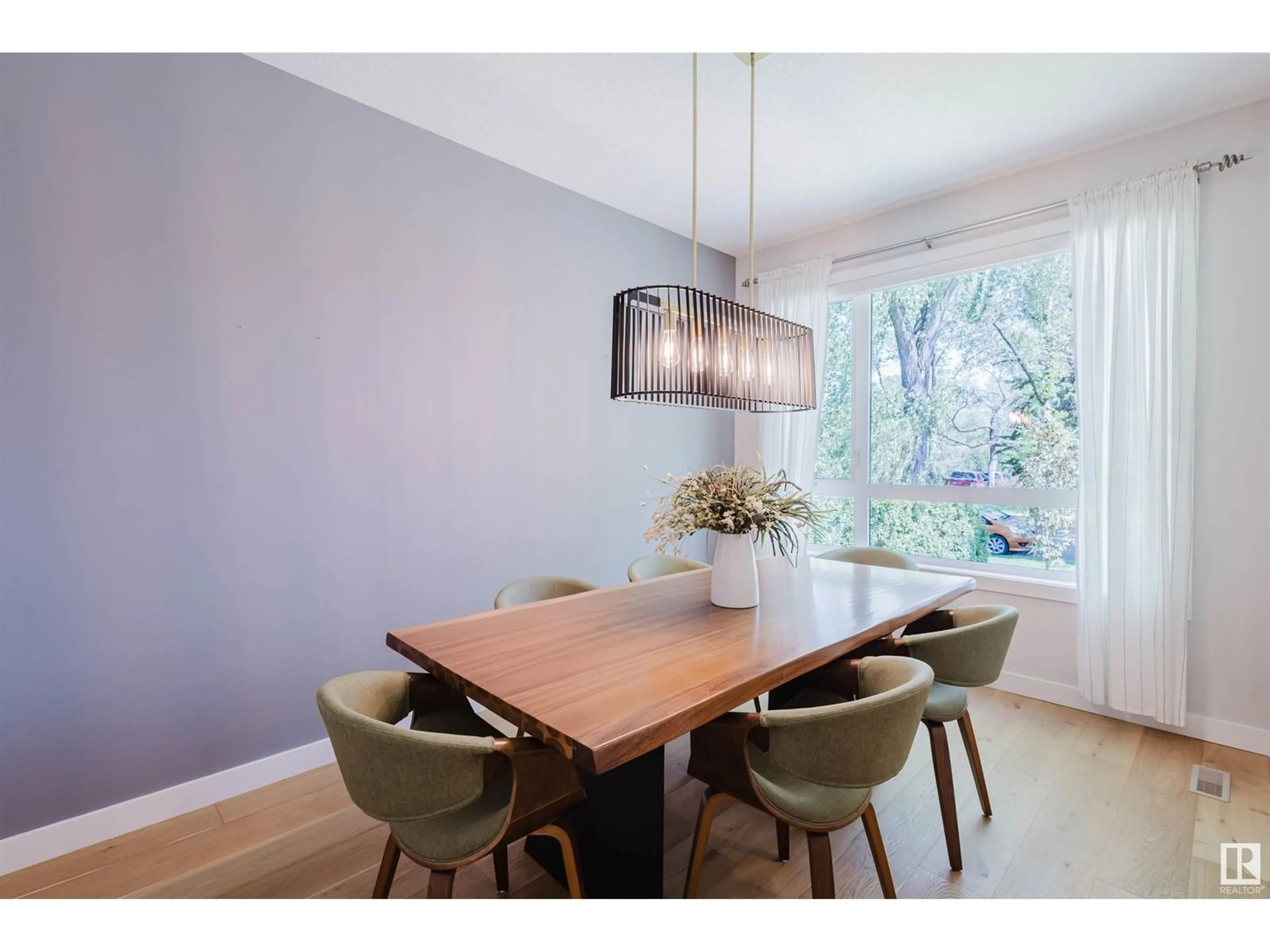Dining room, wood/laminate floor for 9214 81 ST, Edmonton Alberta T6C2W3