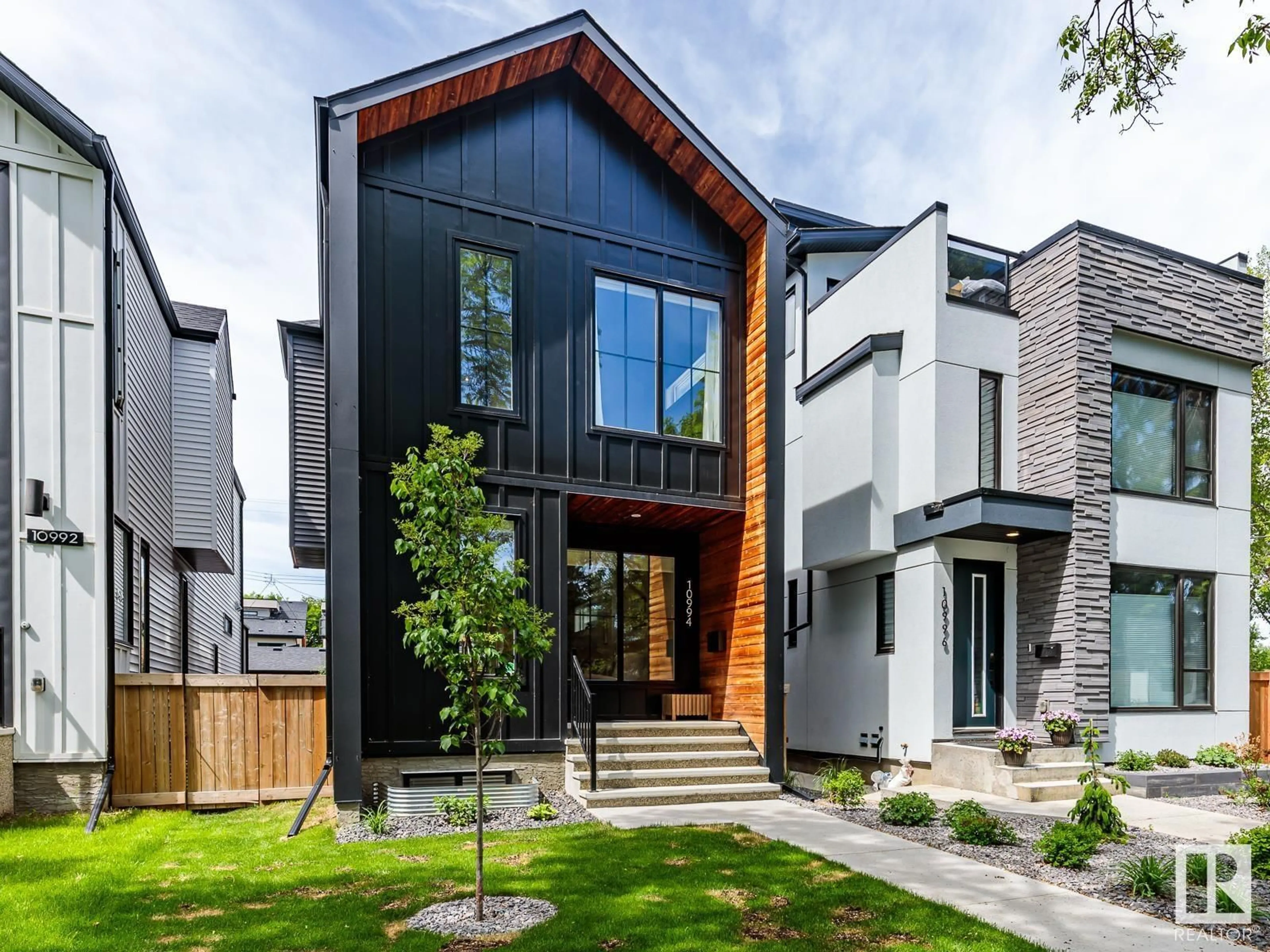 Home with brick exterior material, street for NW - 10994 128 ST, Edmonton Alberta T5M0W4