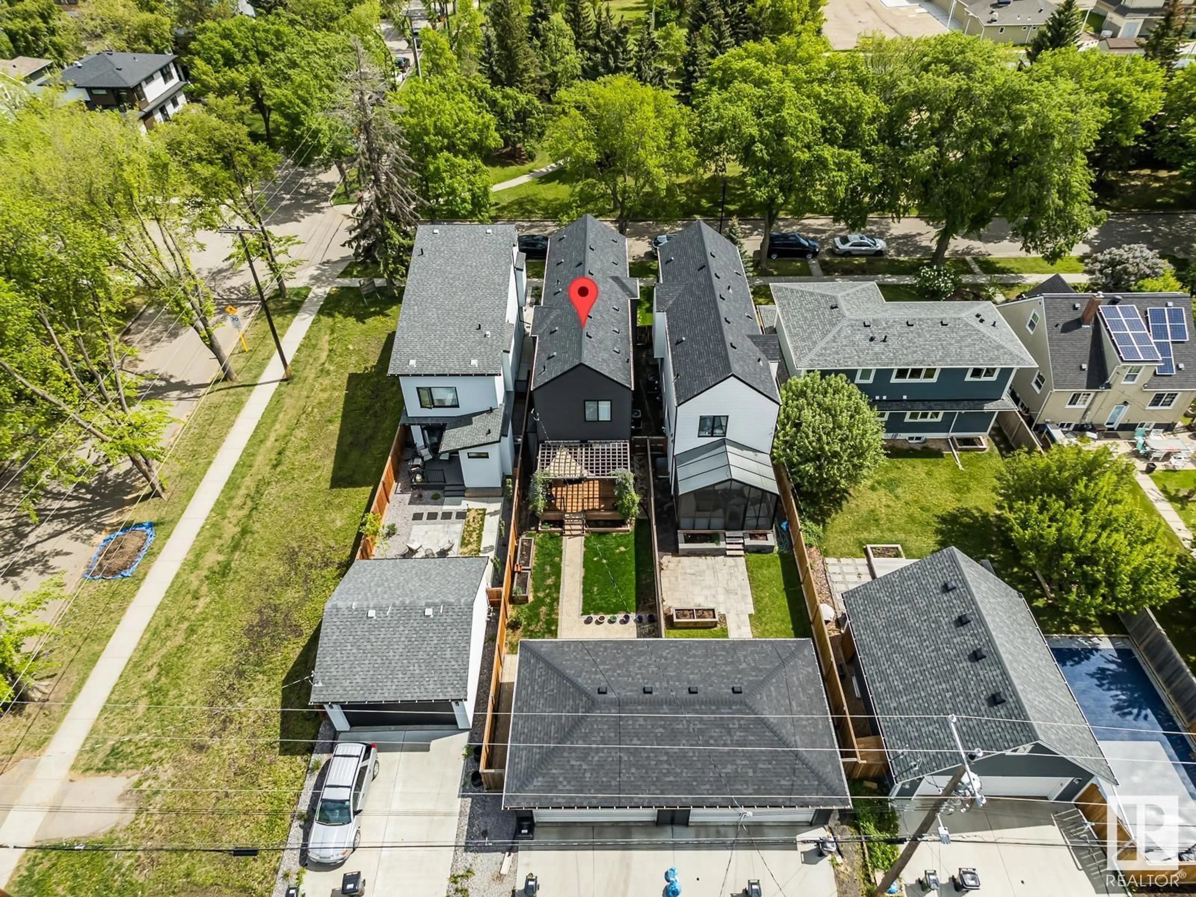 A pic from outside/outdoor area/front of a property/back of a property/a pic from drone, street for NW - 10994 128 ST, Edmonton Alberta T5M0W4