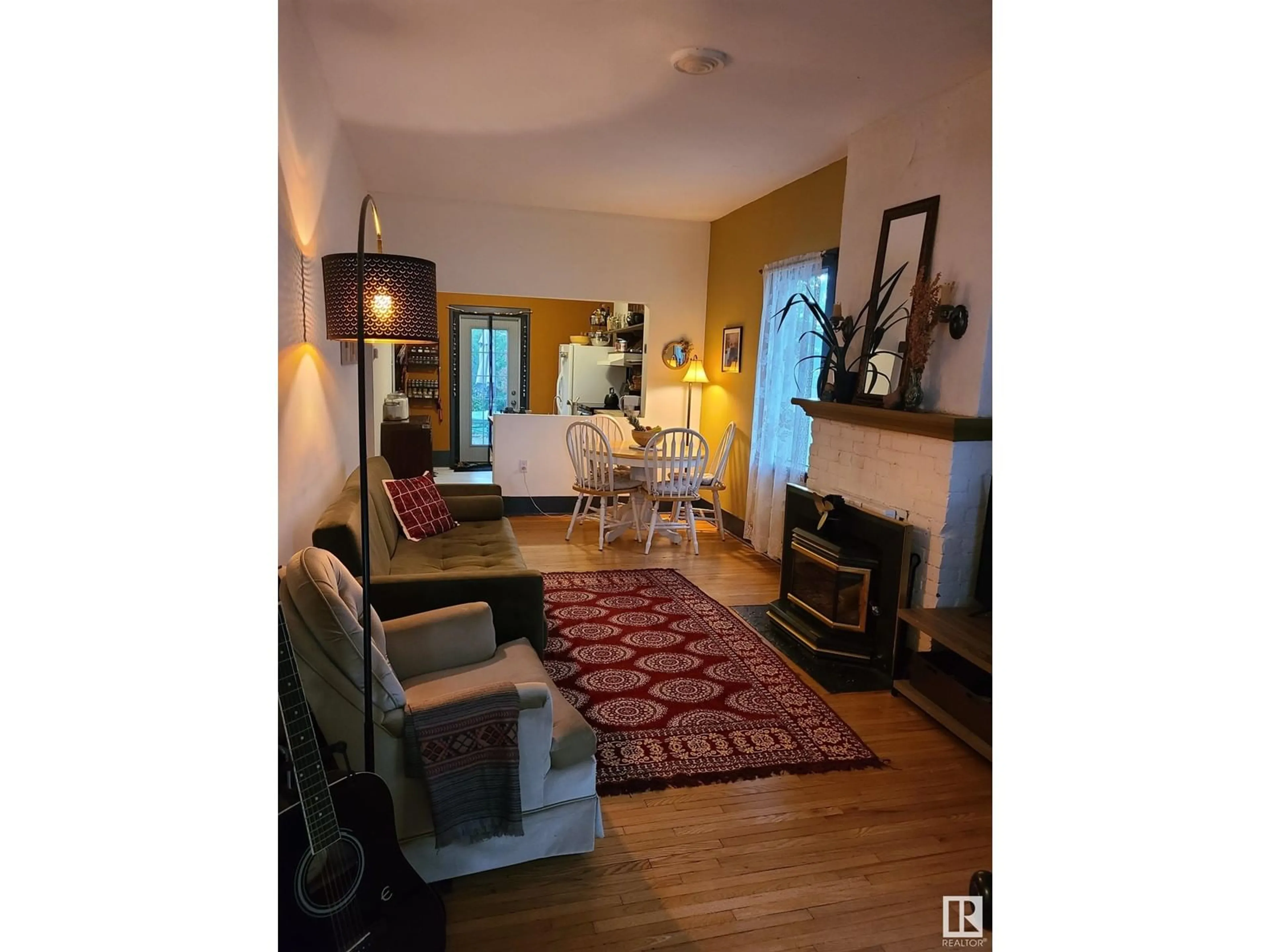 Living room with furniture, unknown for NW - 11512 122 ST, Edmonton Alberta T5M0C1