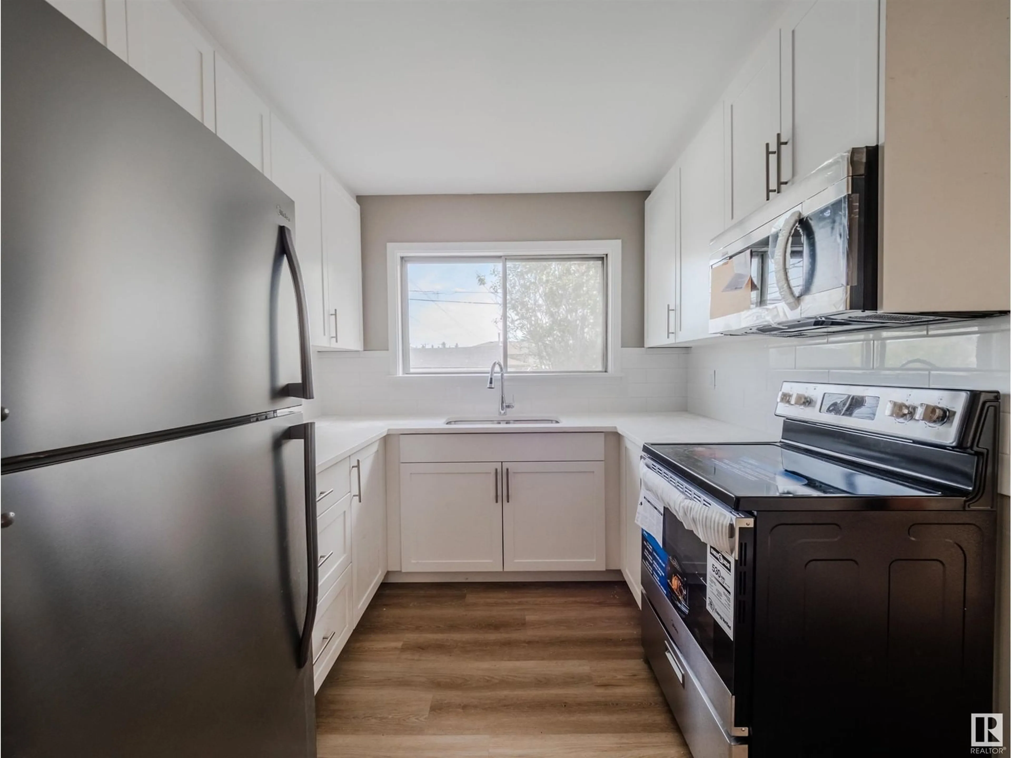 Standard kitchen, wood/laminate floor for 10319 135A AV, Edmonton Alberta T5E2S8