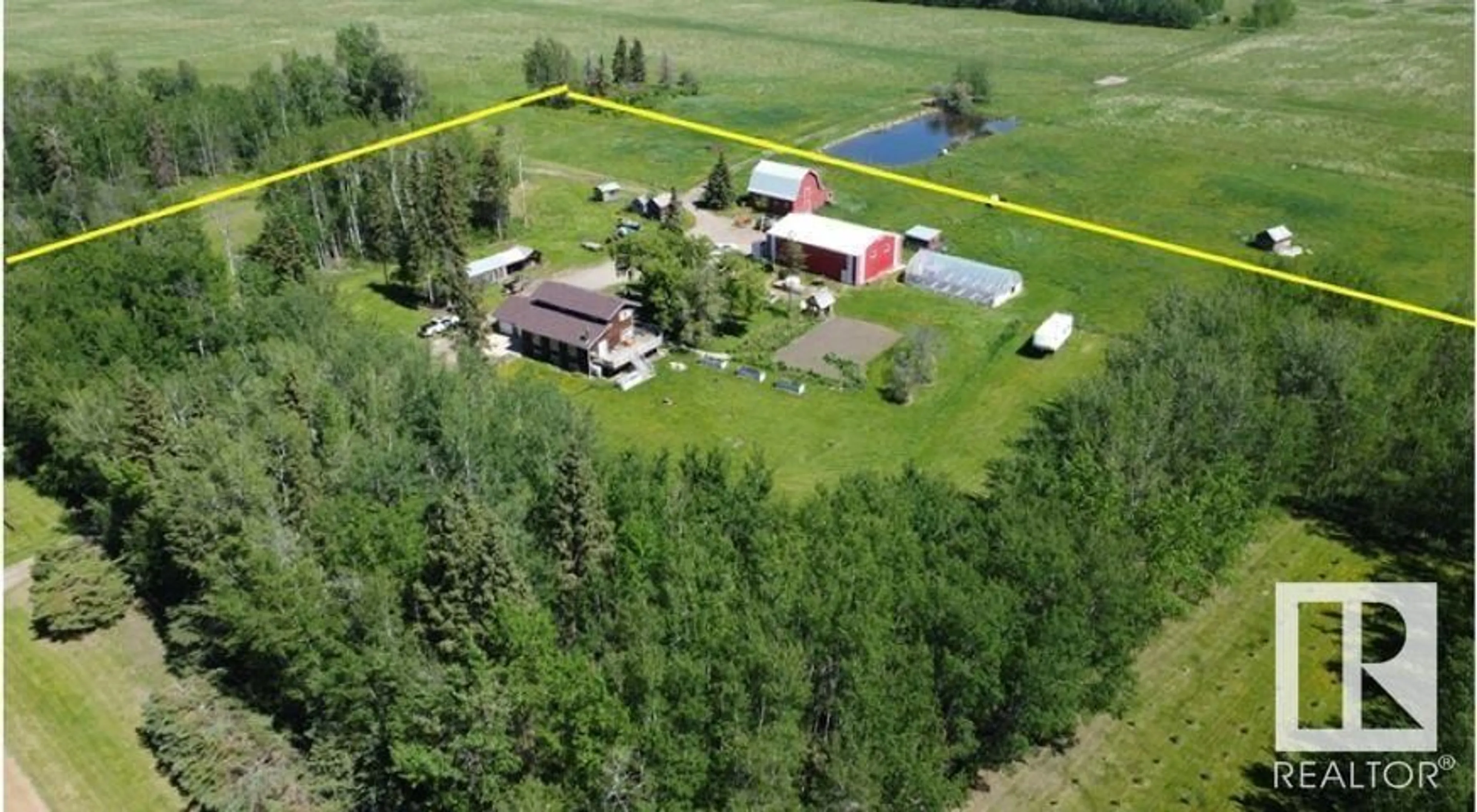 A pic from outside/outdoor area/front of a property/back of a property/a pic from drone, building for 633005 RG RD 240, Rural Athabasca County Alberta T0G1Z0