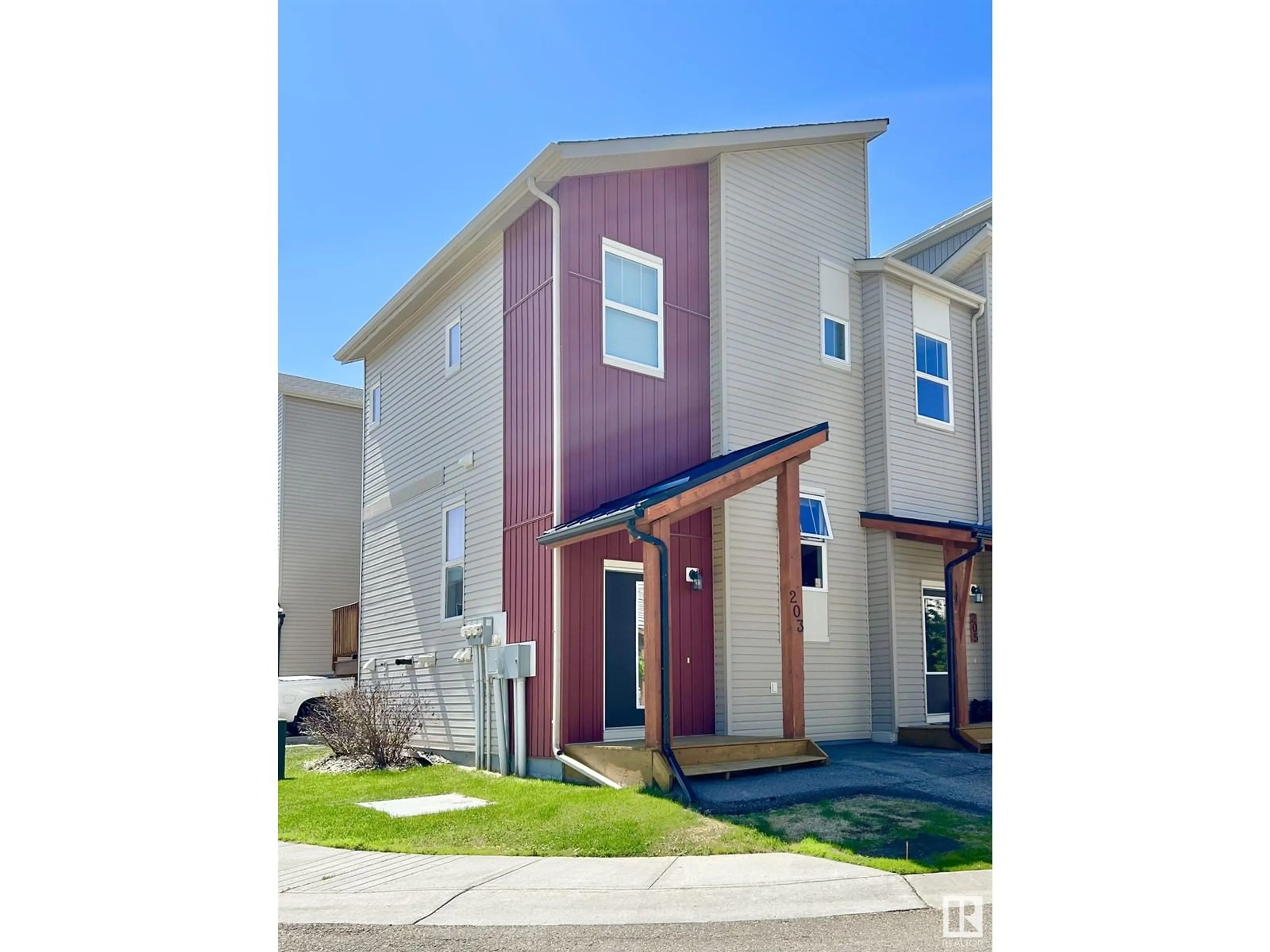 Home with vinyl exterior material, street for #203 - 401 SOUTHFORK DR, Leduc Alberta T9E0X1