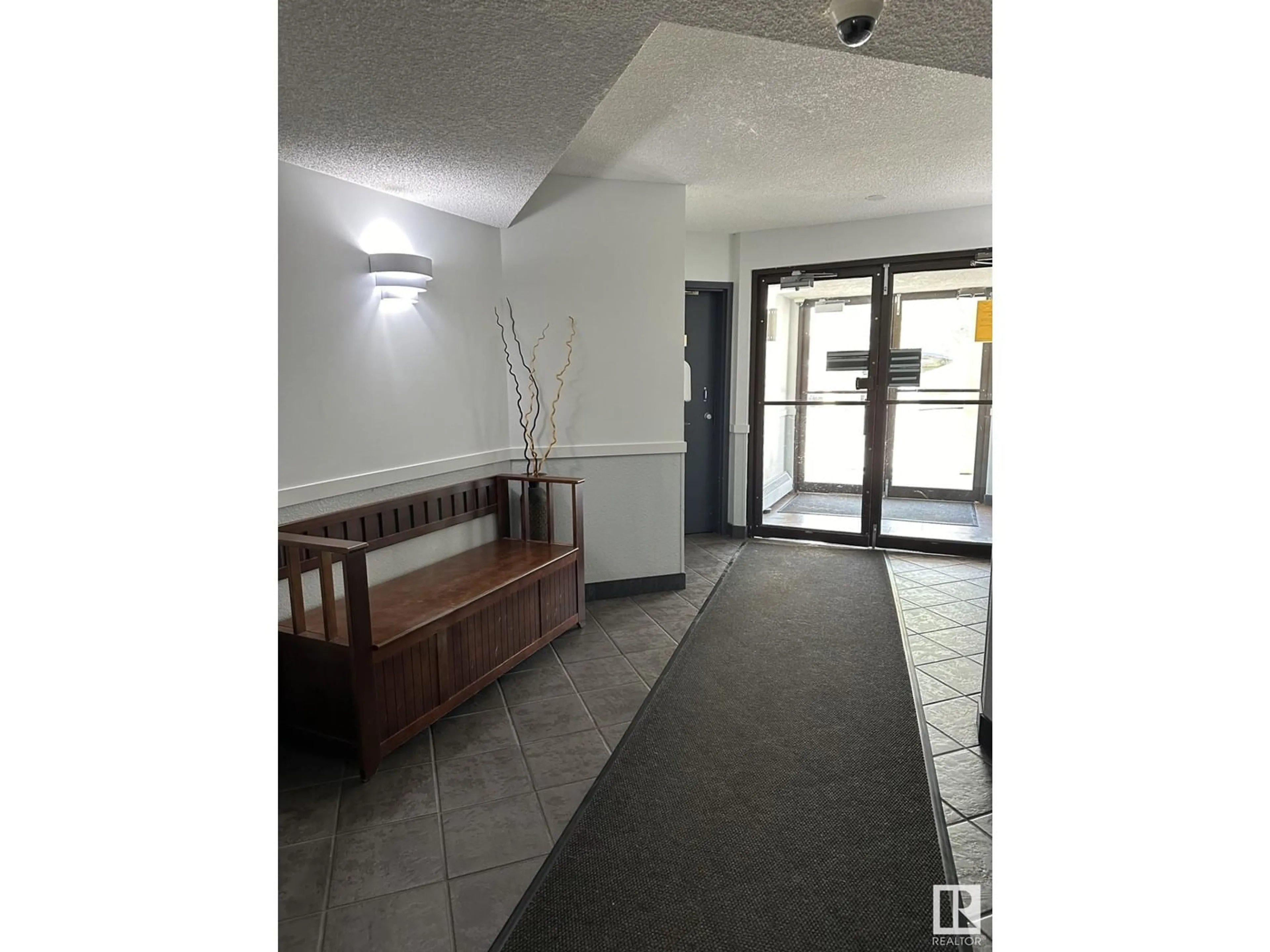 Indoor foyer for #446 - 10636 120 ST, Edmonton Alberta T5H4L5