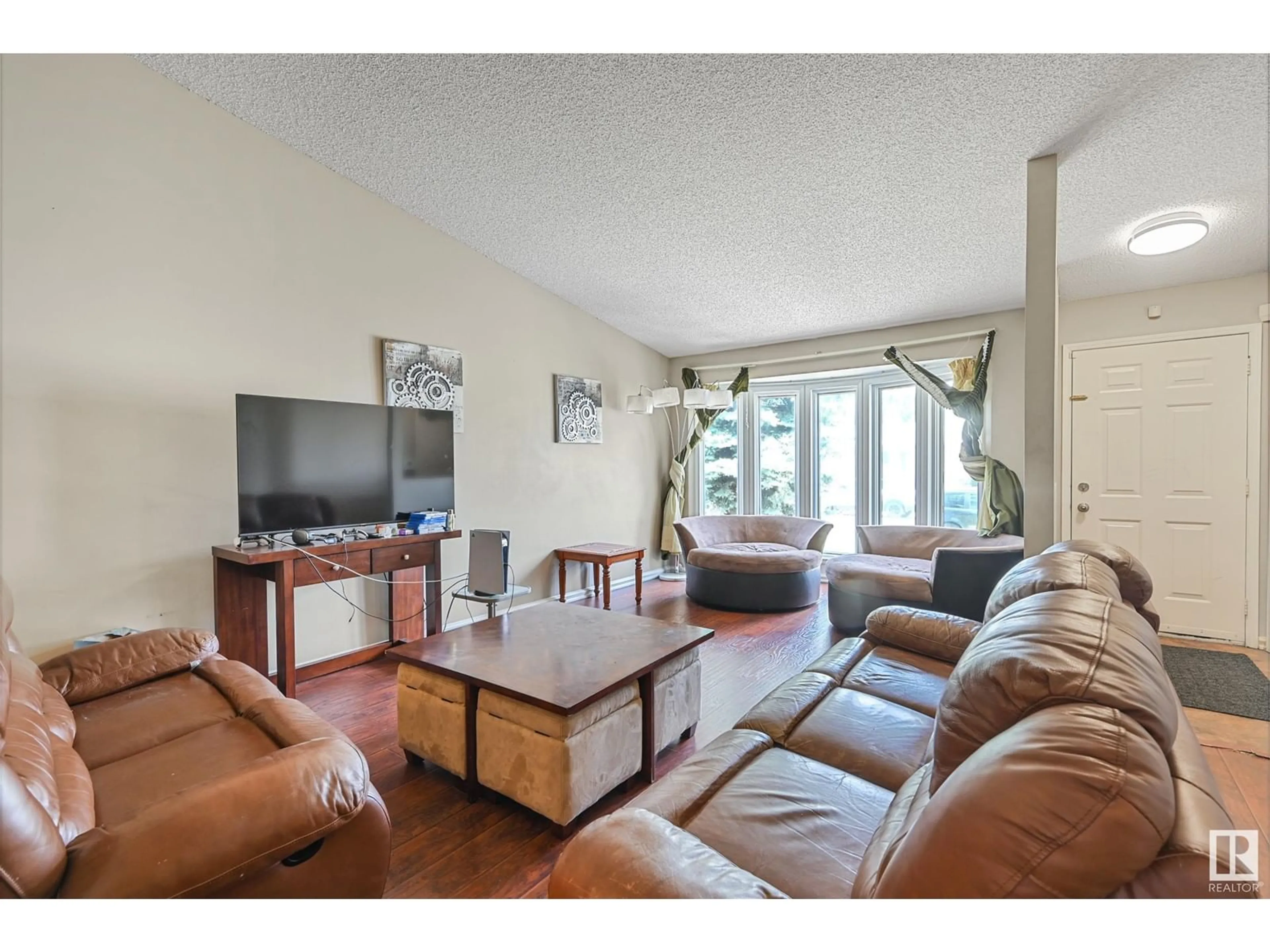Living room with furniture, unknown for 17728 94 ST, Edmonton Alberta T5Z2A4