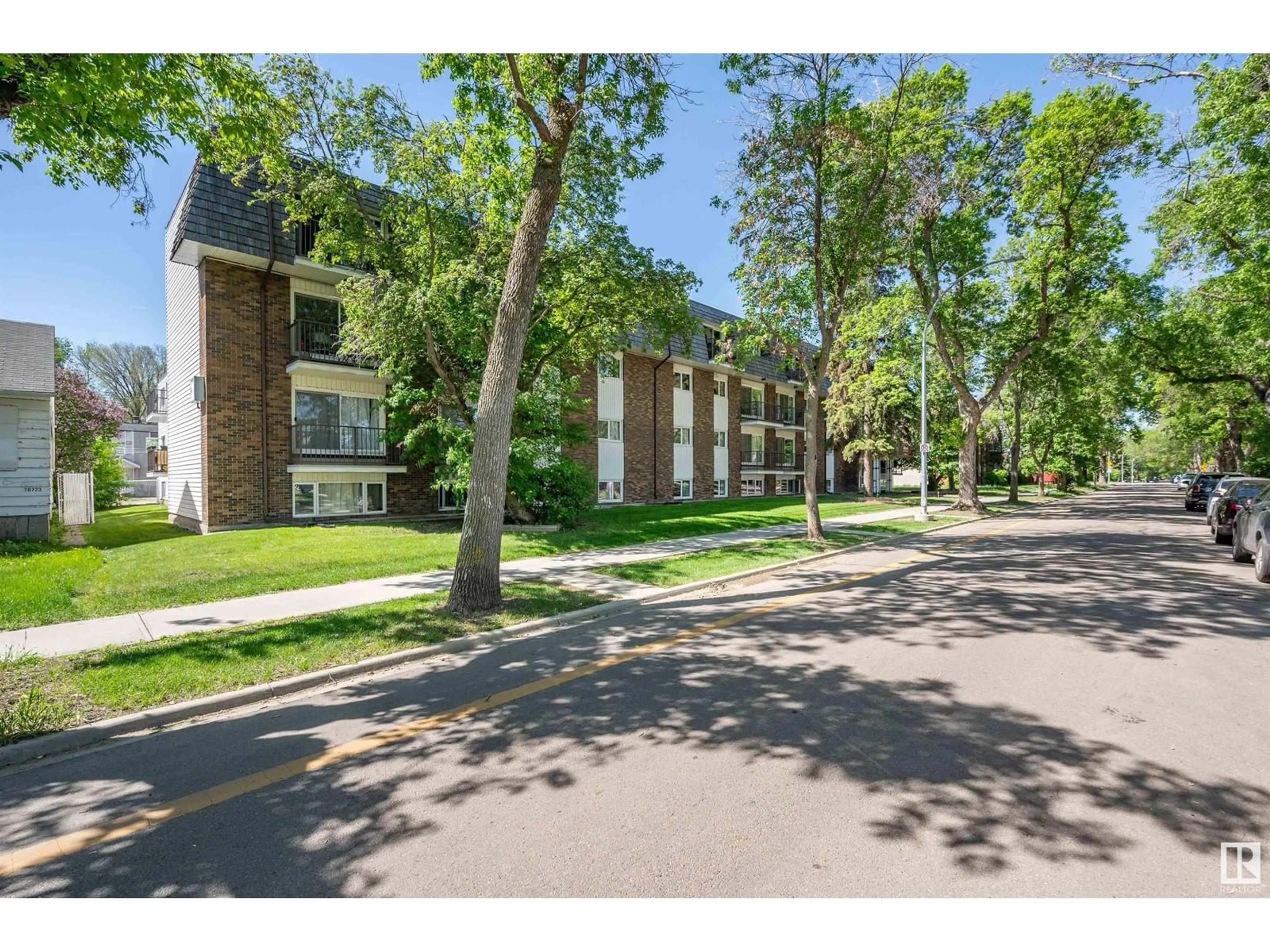 A pic from outside/outdoor area/front of a property/back of a property/a pic from drone, street for #105 - 10735 81 AV, Edmonton Alberta T6E1Y2