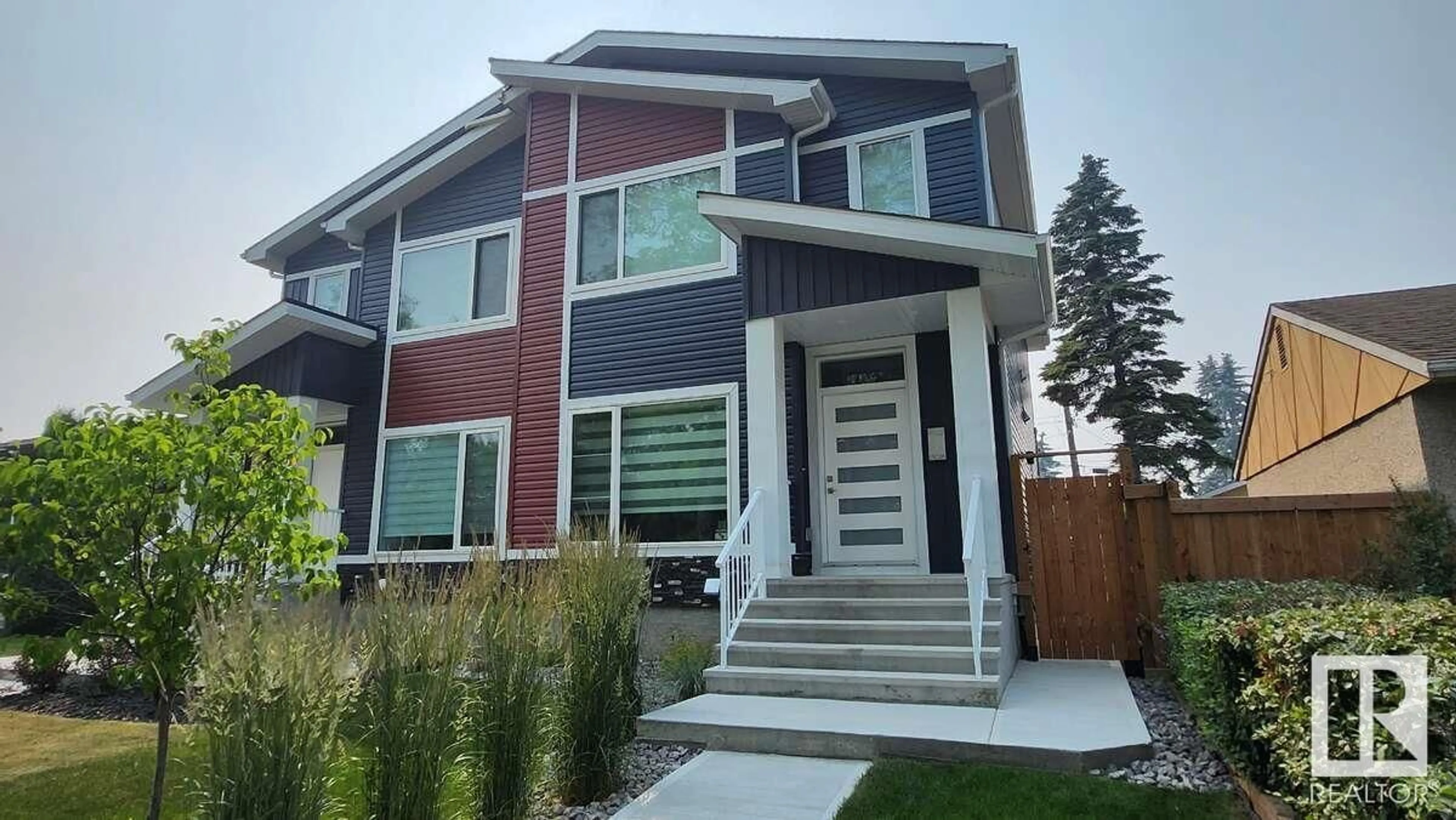 Home with vinyl exterior material, street for NW - 13026 120 ST, Edmonton Alberta T5E5N9
