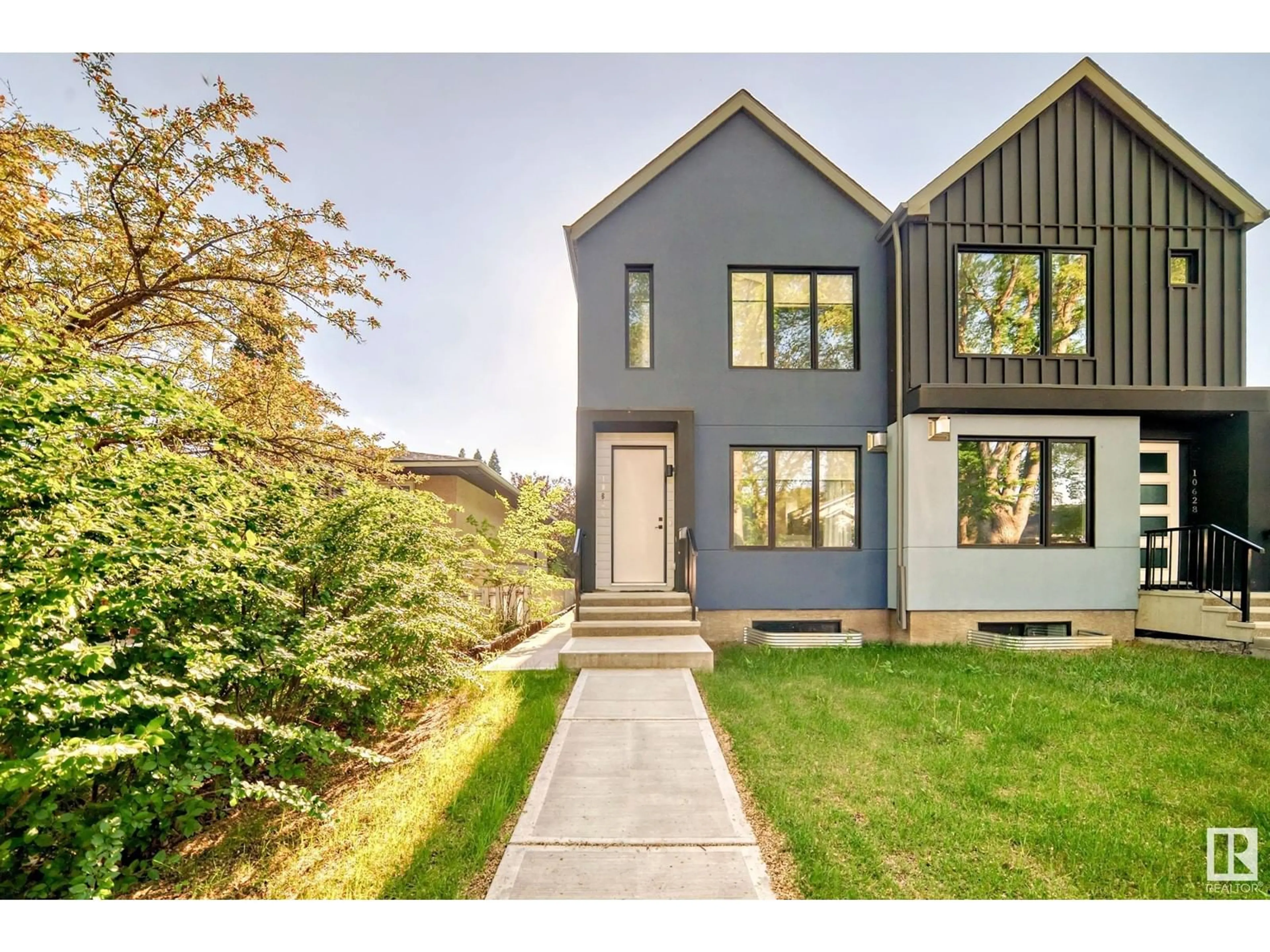 Home with vinyl exterior material, street for NW - 10626 81 ST, Edmonton Alberta T6A3L4