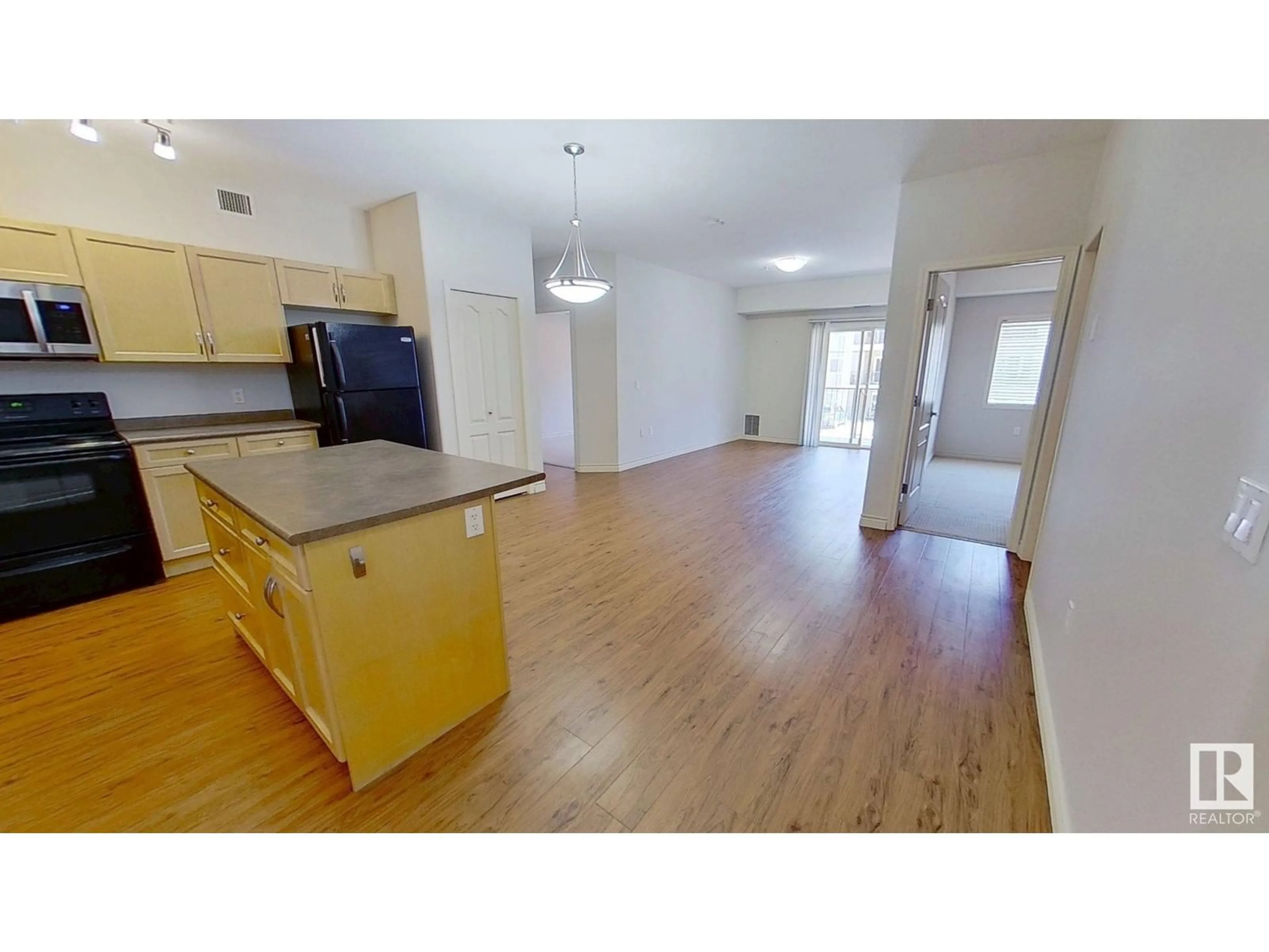 Open concept kitchen, wood/laminate floor for 211 105 WEST HAVEN DR, Leduc Alberta T9E0R9