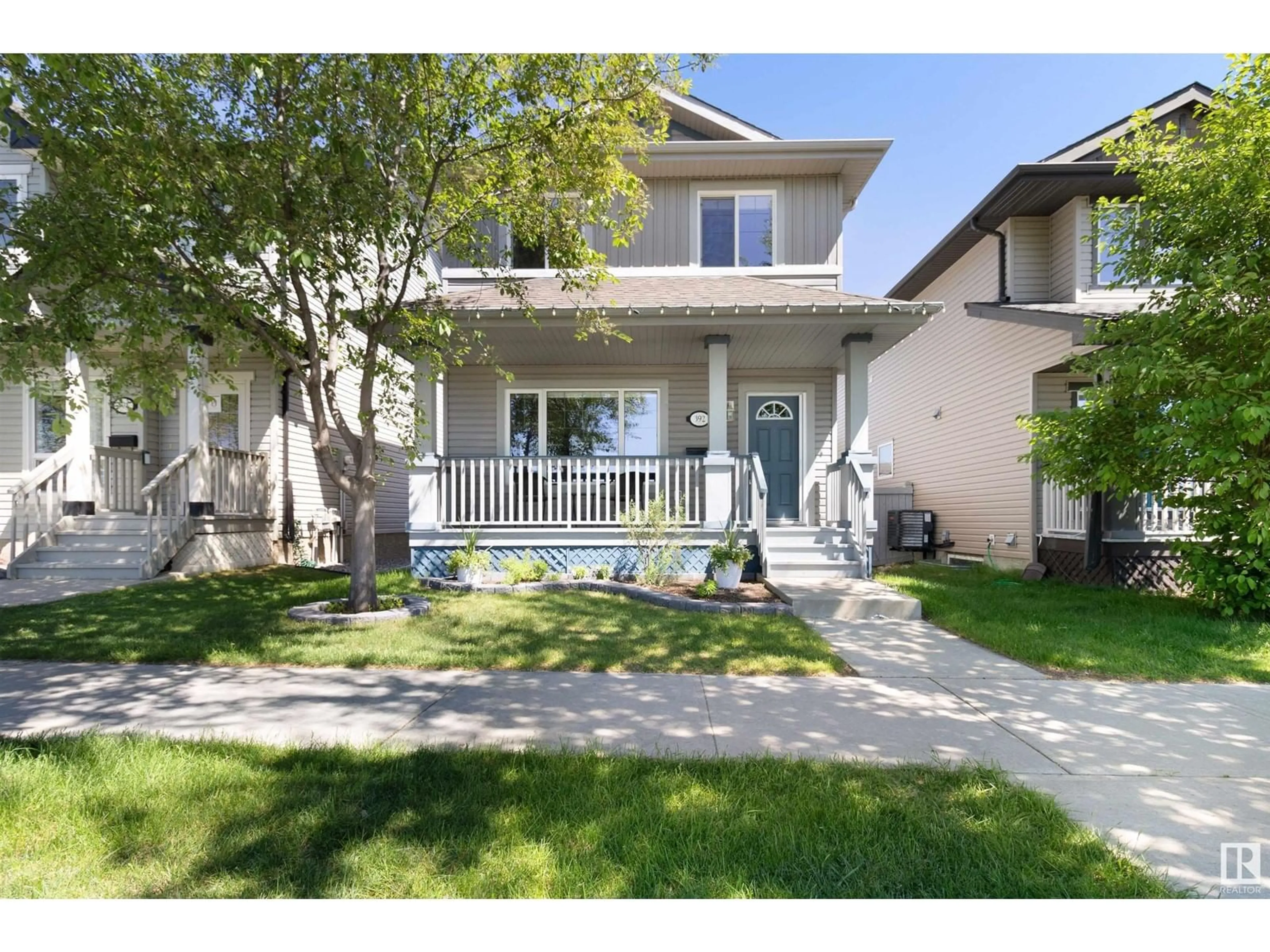Home with vinyl exterior material, street for 392 HEMINGWAY RD, Edmonton Alberta T6M0J8