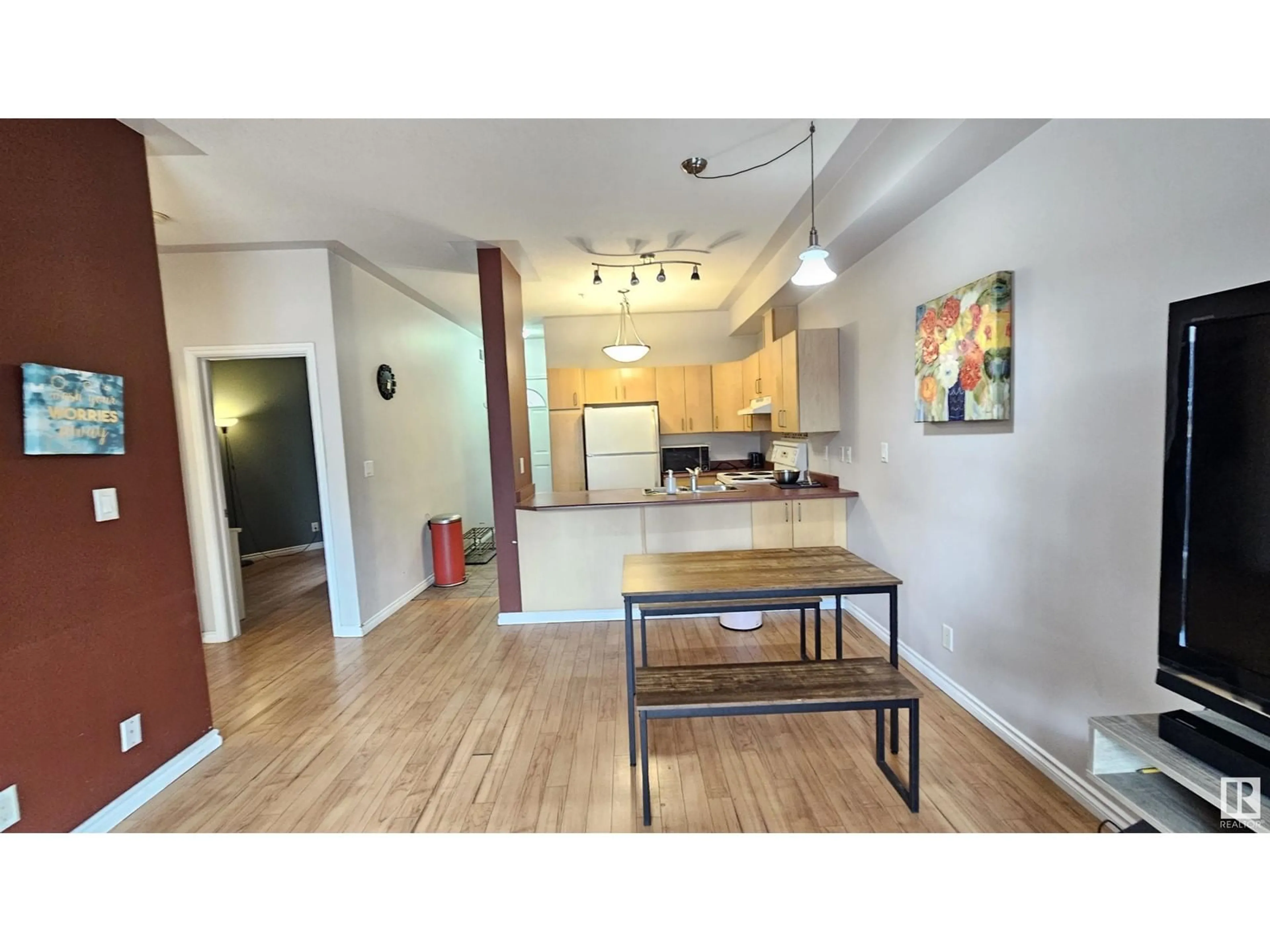 Open concept kitchen, wood/laminate floor for 203 - 10707 102 AV, Edmonton Alberta T5J5E4
