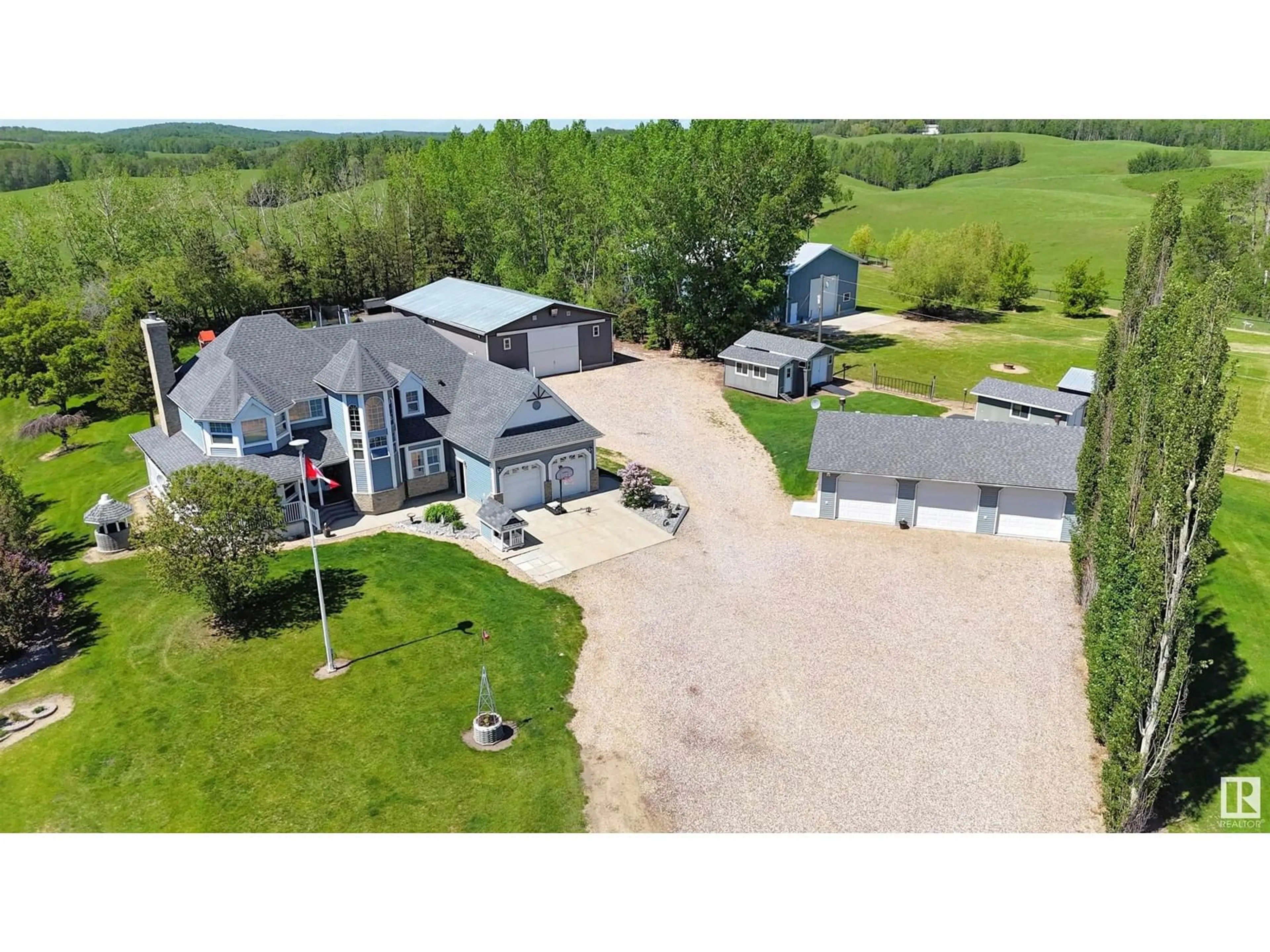 A pic from outside/outdoor area/front of a property/back of a property/a pic from drone, unknown for 53502 RGE ROAD 11, Rural Parkland County Alberta T7Y0A6