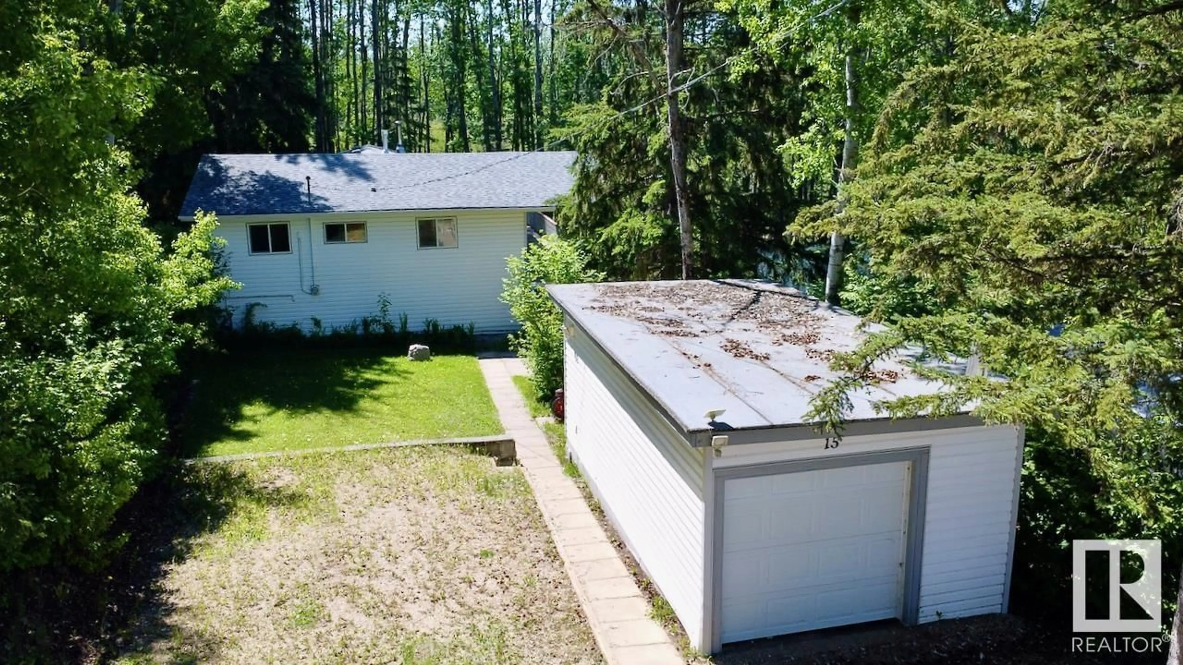 A pic from outside/outdoor area/front of a property/back of a property/a pic from drone, unknown for 15 - 54114 RGE ROAD 52, Rural Lac Ste. Anne County Alberta T0E0L0