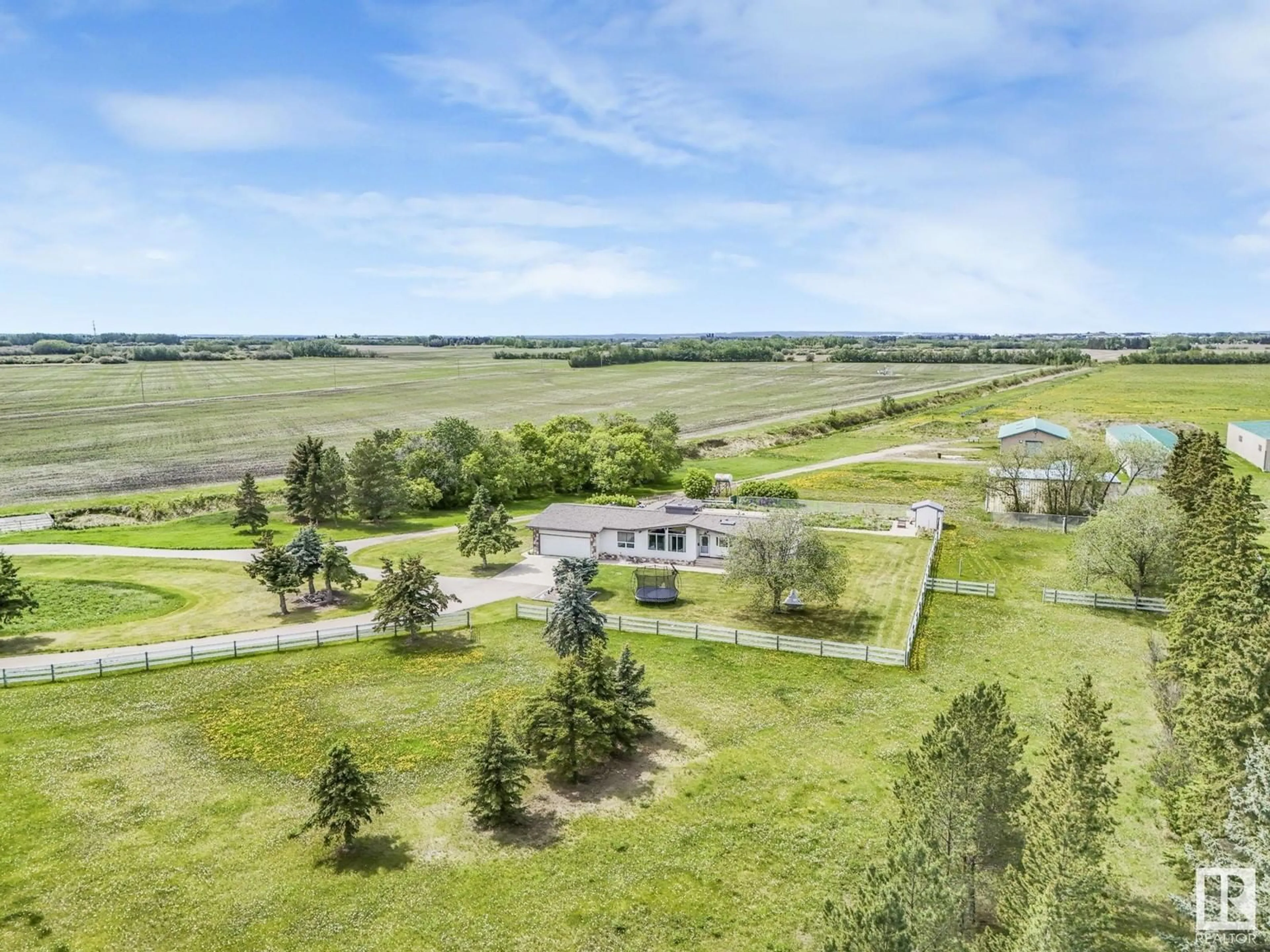 A pic from outside/outdoor area/front of a property/back of a property/a pic from drone, unknown for 54320 HWY 2, St. Albert Alberta T8T1T1