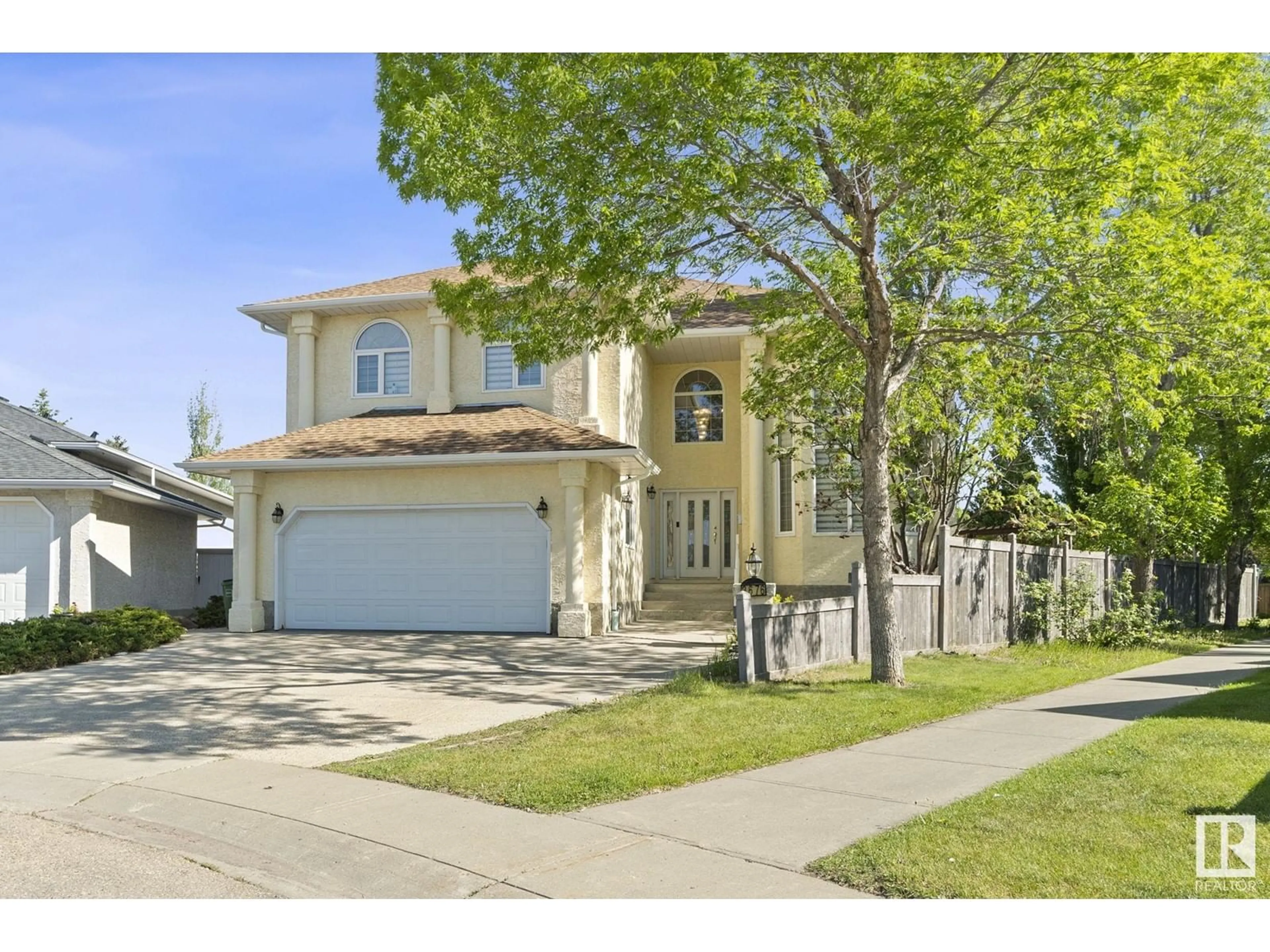 Home with vinyl exterior material, street for 3676 30 ST, Edmonton Alberta T6T1K3
