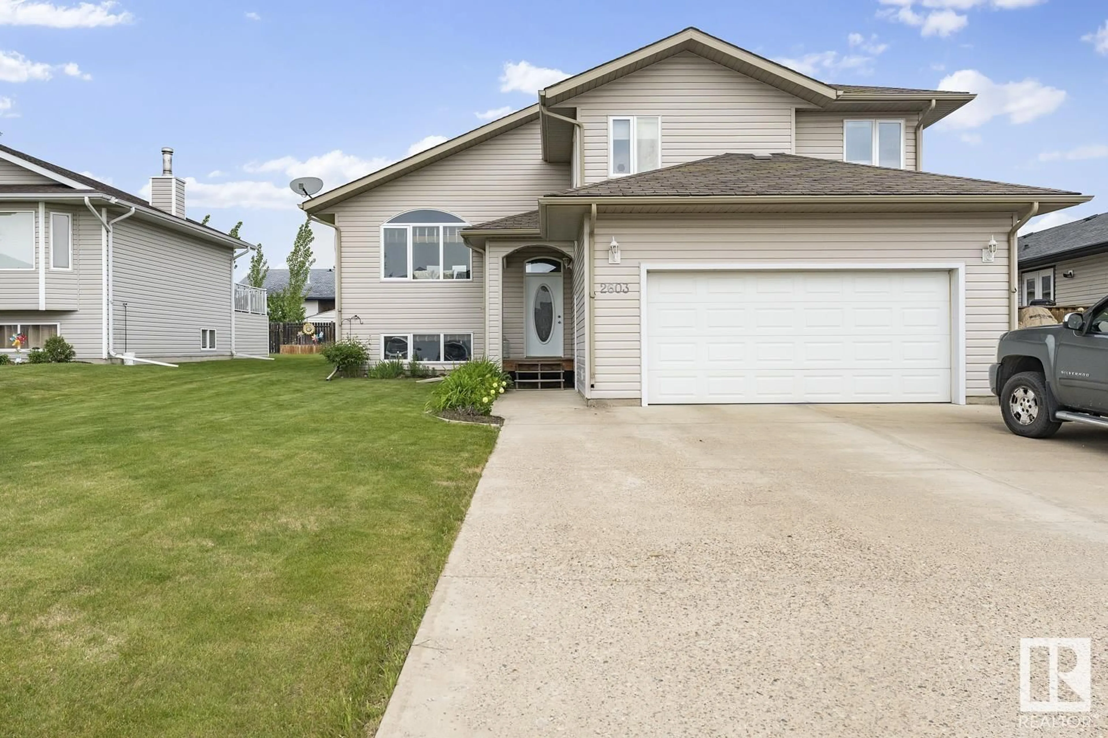 Home with vinyl exterior material, street for 2603 6 AV, Cold Lake Alberta T9M2C7