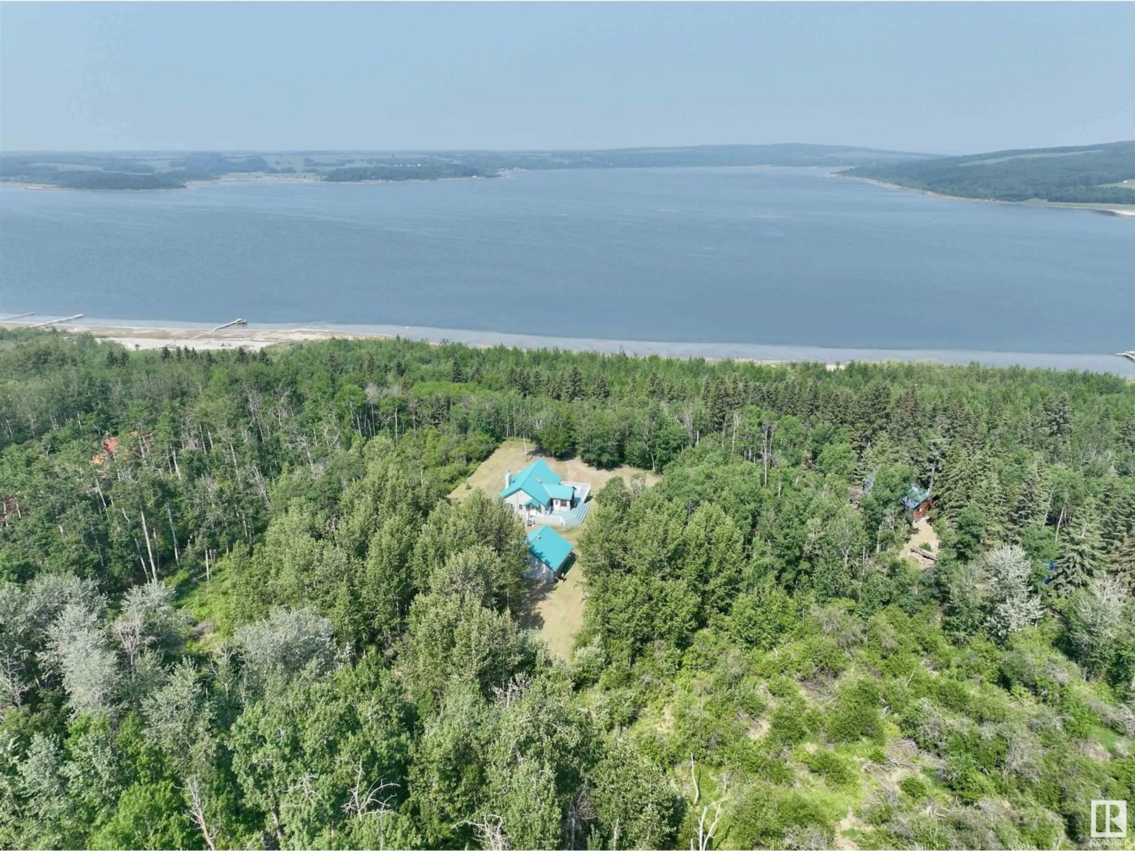A pic from outside/outdoor area/front of a property/back of a property/a pic from drone, water/lake/river/ocean view for 1007 12272 TWP RD 602, Rural Smoky Lake County Alberta T0A3E0