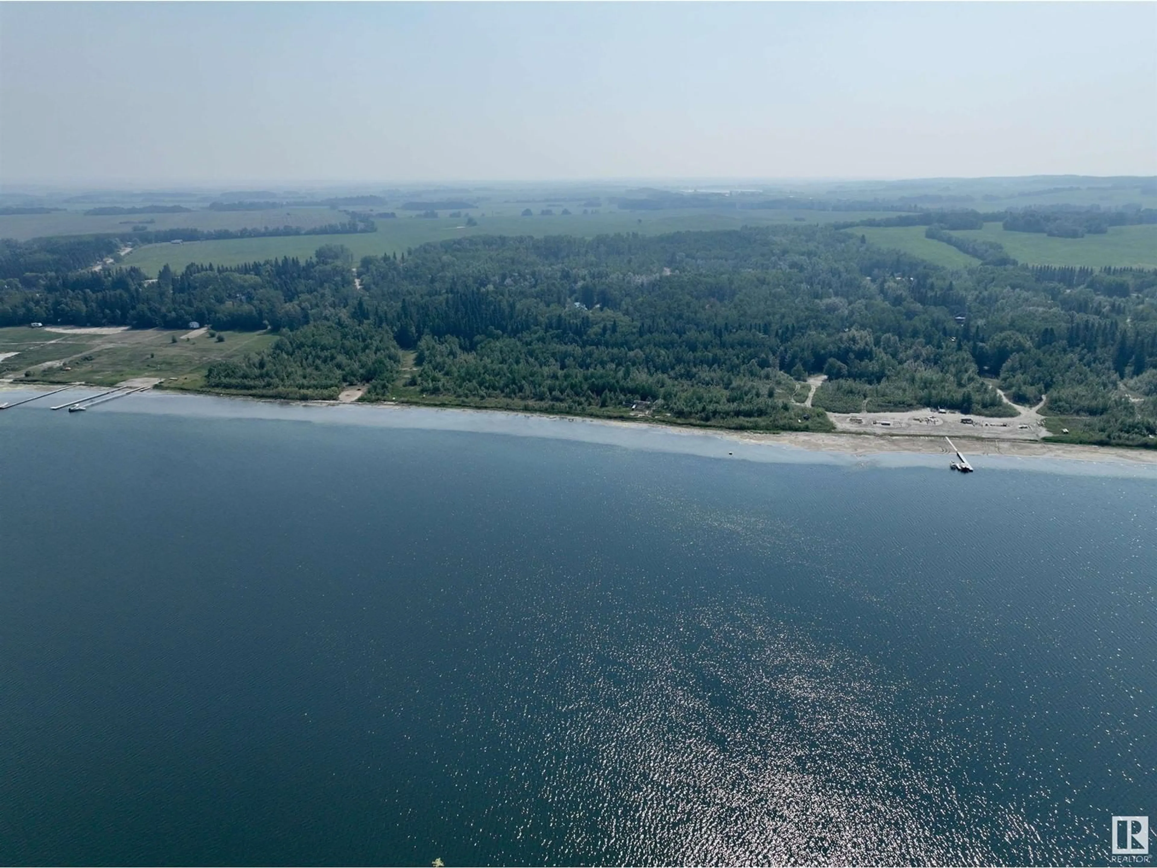 A pic from outside/outdoor area/front of a property/back of a property/a pic from drone, water/lake/river/ocean view for 1007 12272 TWP RD 602, Rural Smoky Lake County Alberta T0A3E0