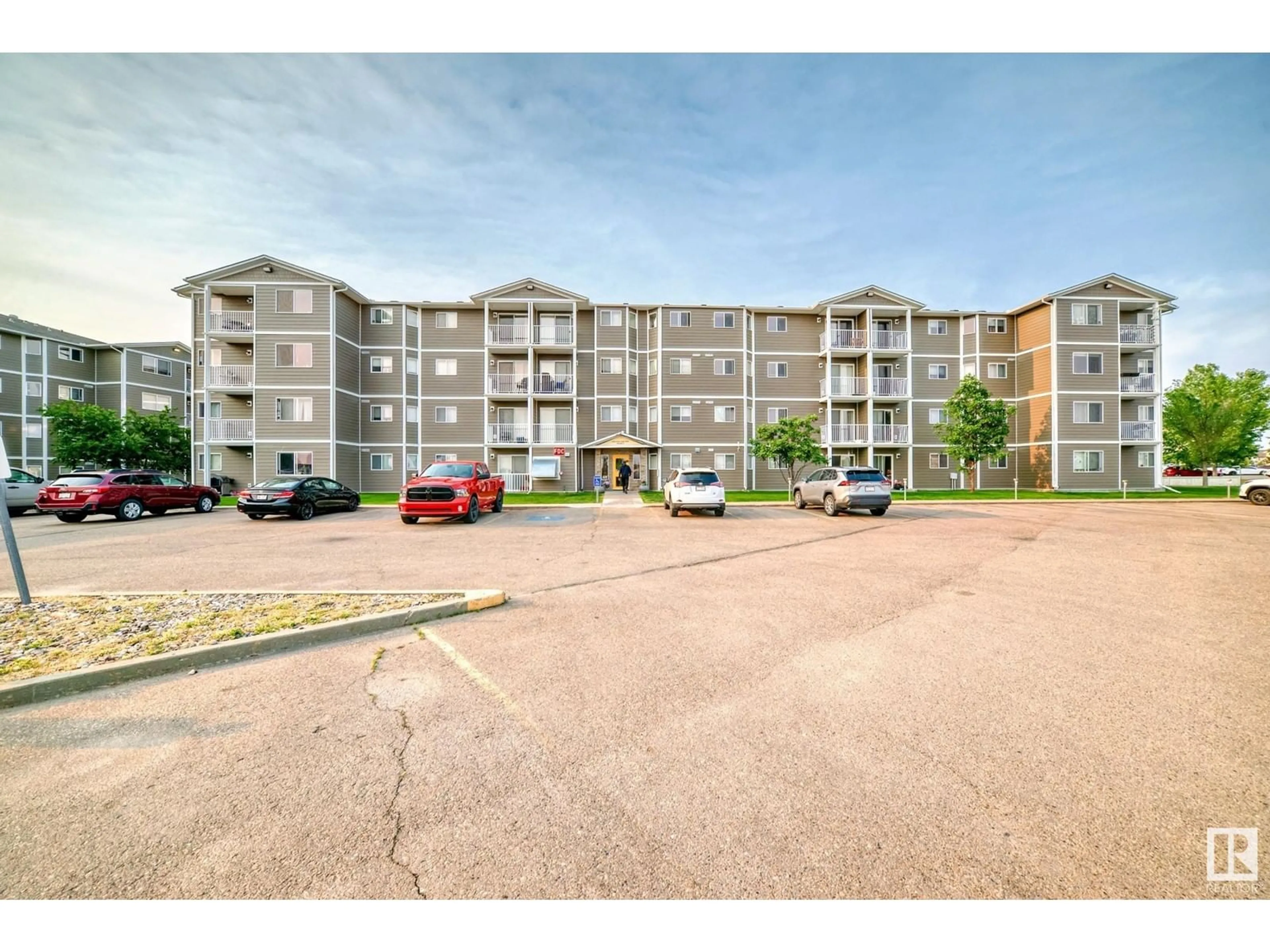 A pic from outside/outdoor area/front of a property/back of a property/a pic from drone, unknown for #401A - 260 SPRUCE RIDGE RD, Spruce Grove Alberta T7X0A1