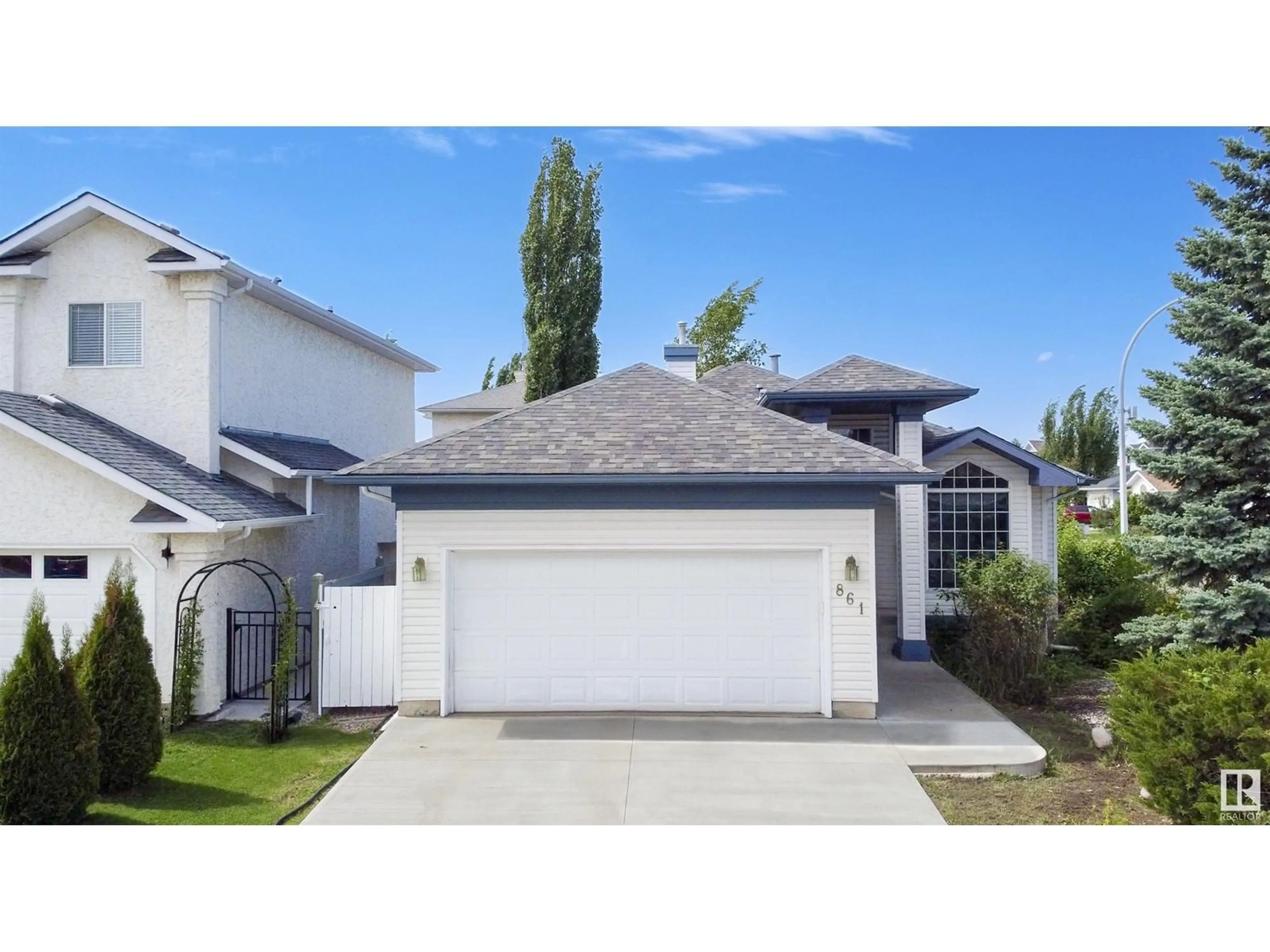Home with vinyl exterior material, street for 861 RYAN PL, Edmonton Alberta T6R2N1