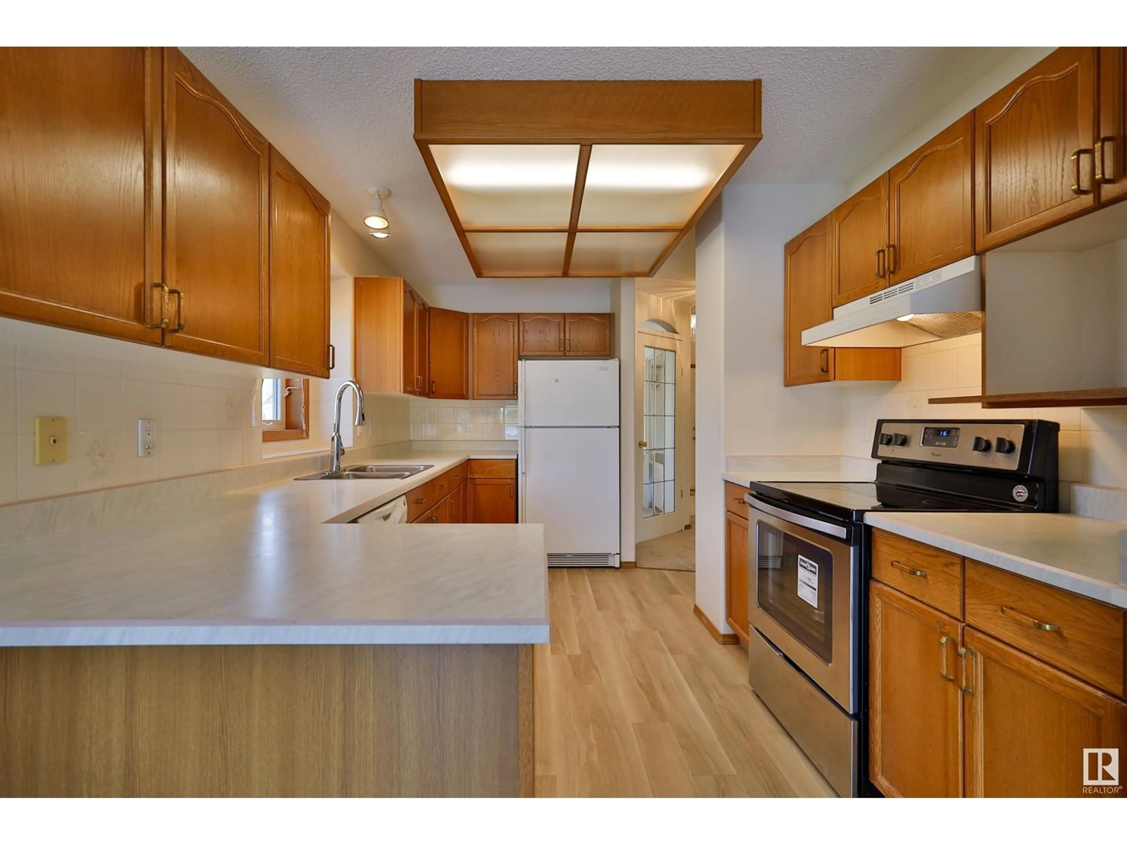 Standard kitchen, wood/laminate floor for 861 RYAN PL, Edmonton Alberta T6R2N1