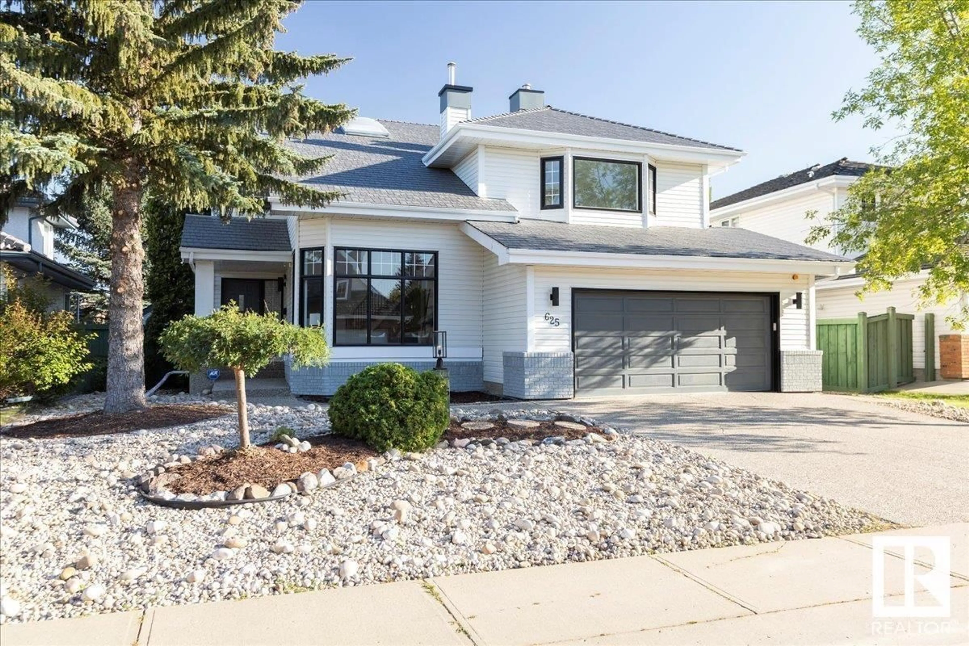 Home with vinyl exterior material, street for 625 WOTHERSPOON CL, Edmonton Alberta T6M2K2