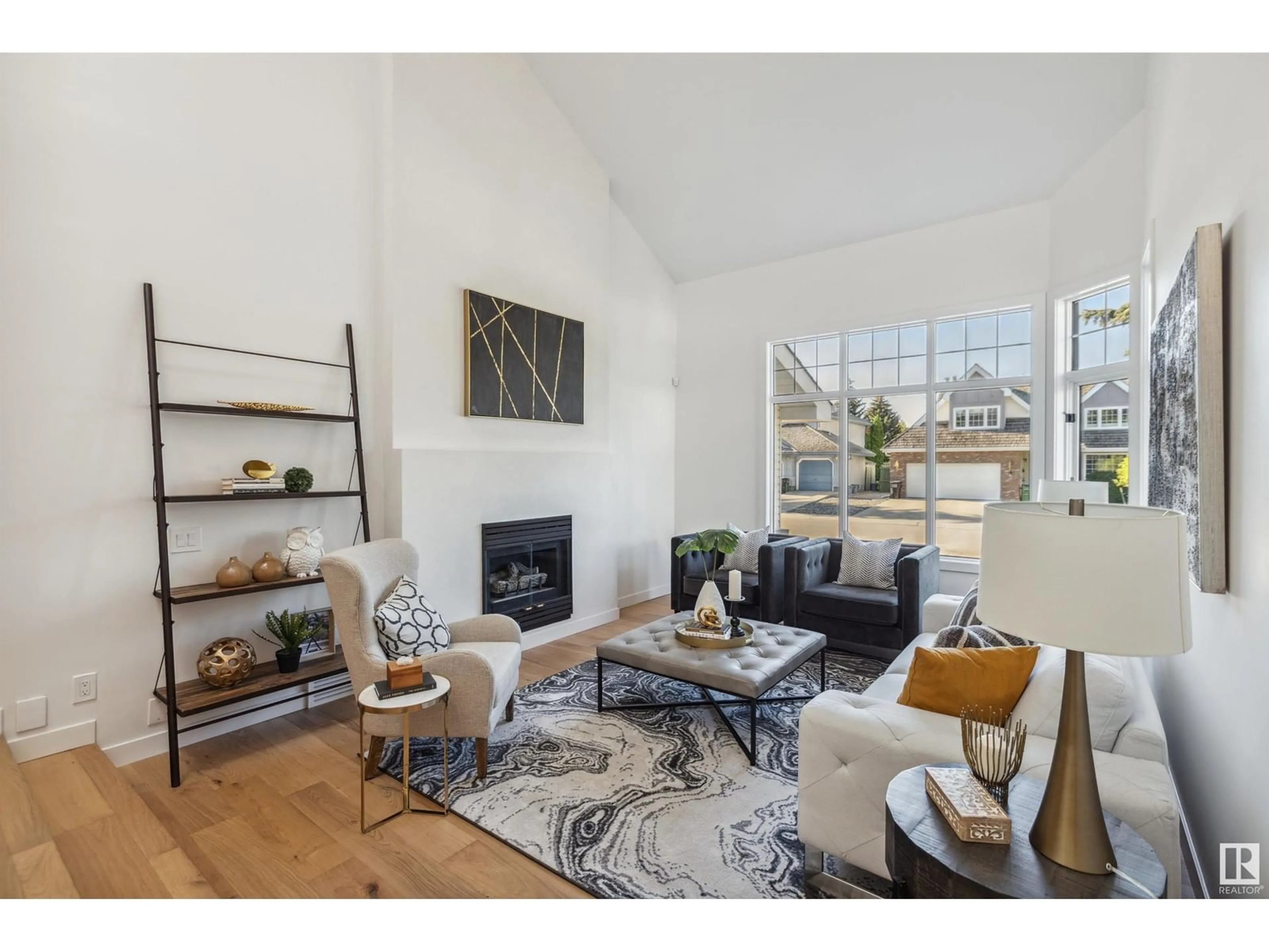 Living room with furniture, wood/laminate floor for 625 WOTHERSPOON CL, Edmonton Alberta T6M2K2