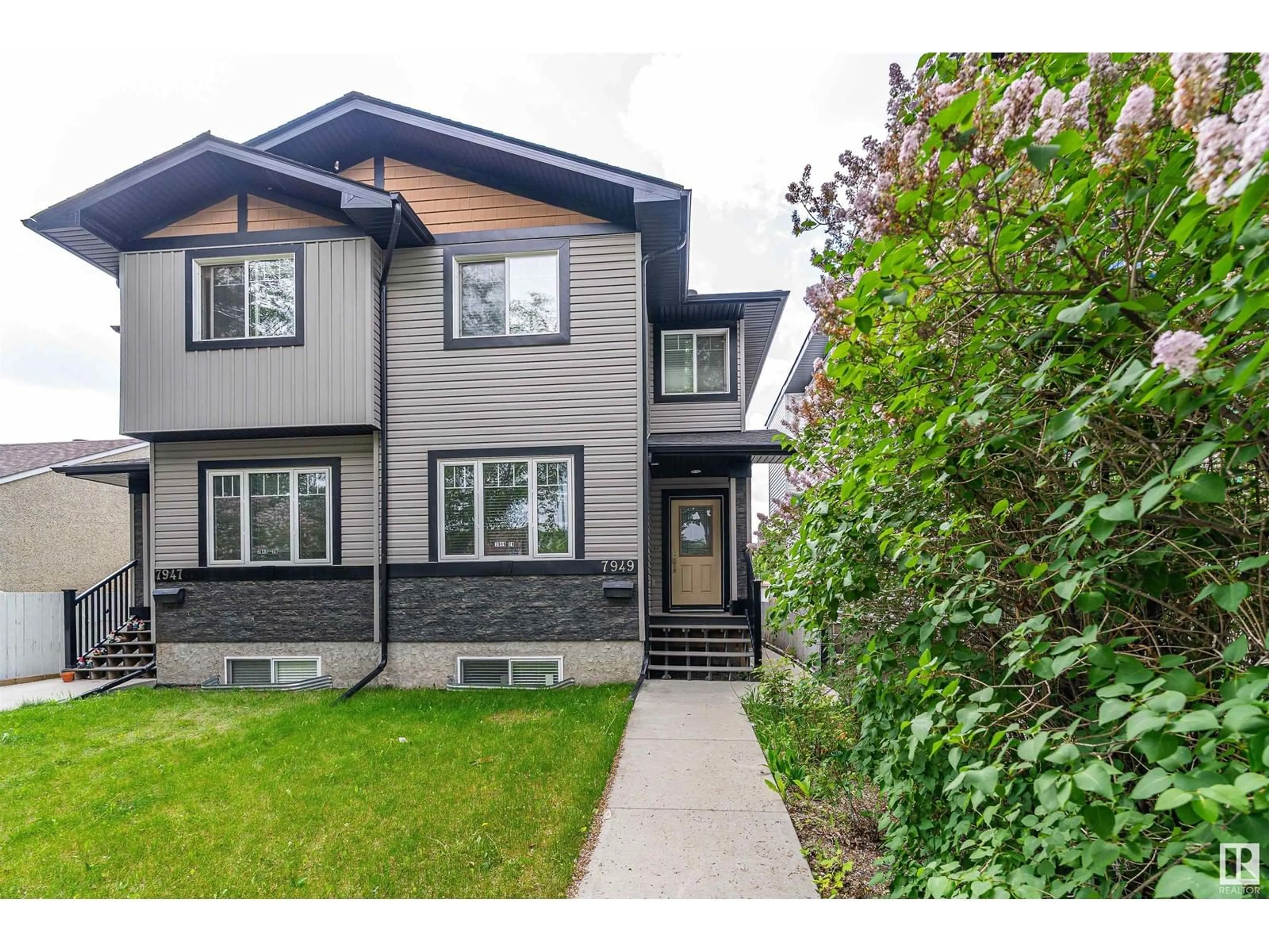Home with vinyl exterior material, street for 7949 79 AV, Edmonton Alberta T6C0P7