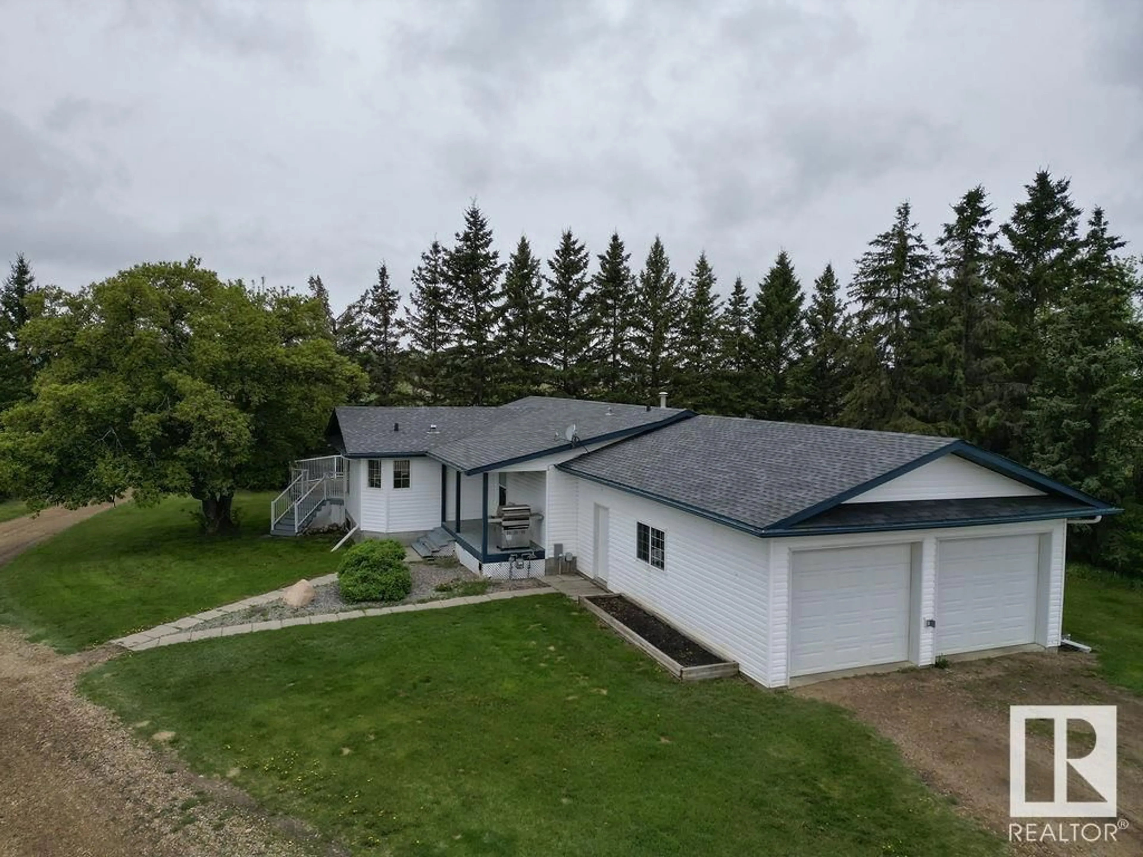 A pic from outside/outdoor area/front of a property/back of a property/a pic from drone, unknown for 60319 RGE RD 252, Rural Westlock County Alberta T0G0P0